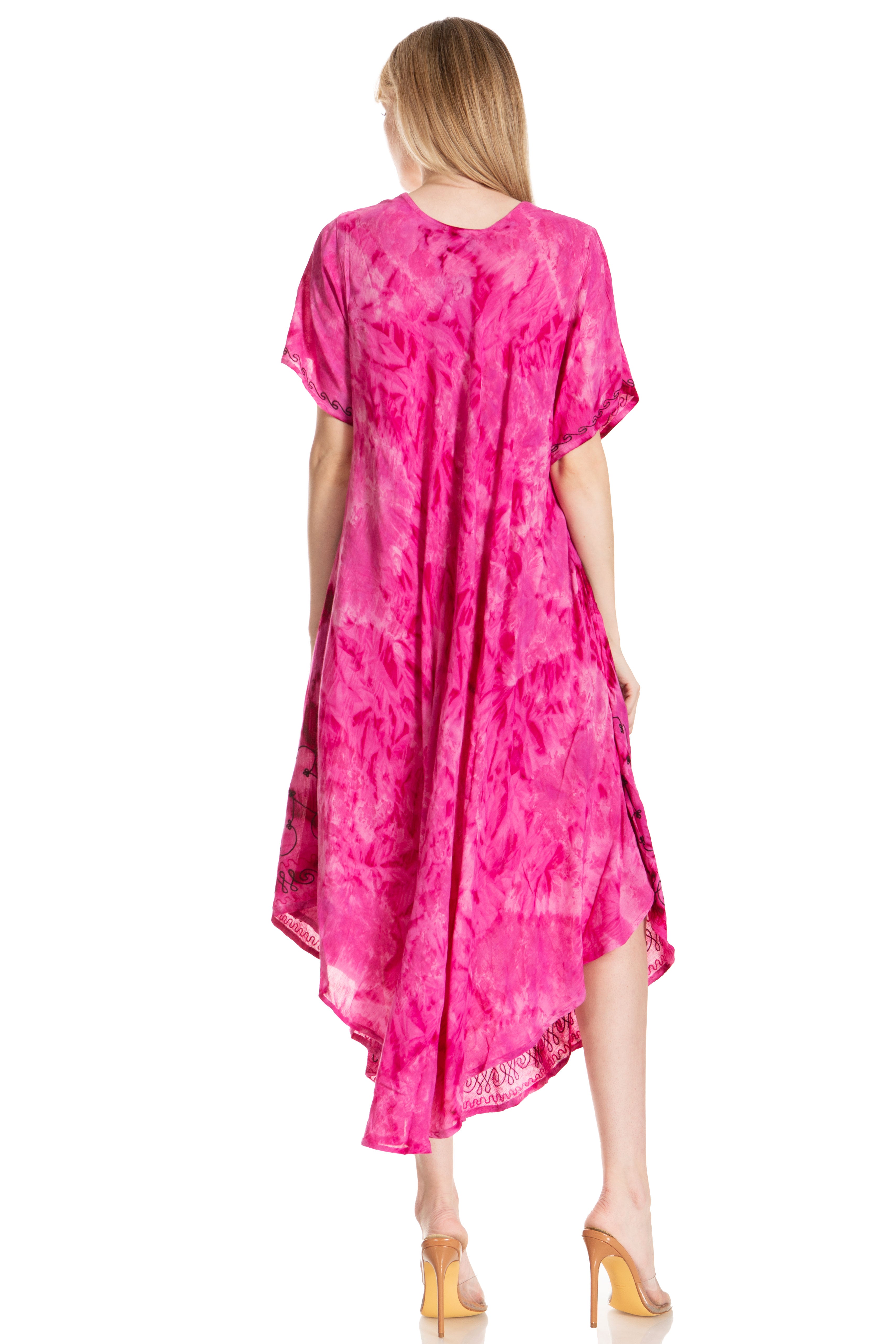 Woman wearing a pink tie-dye dress on a white background