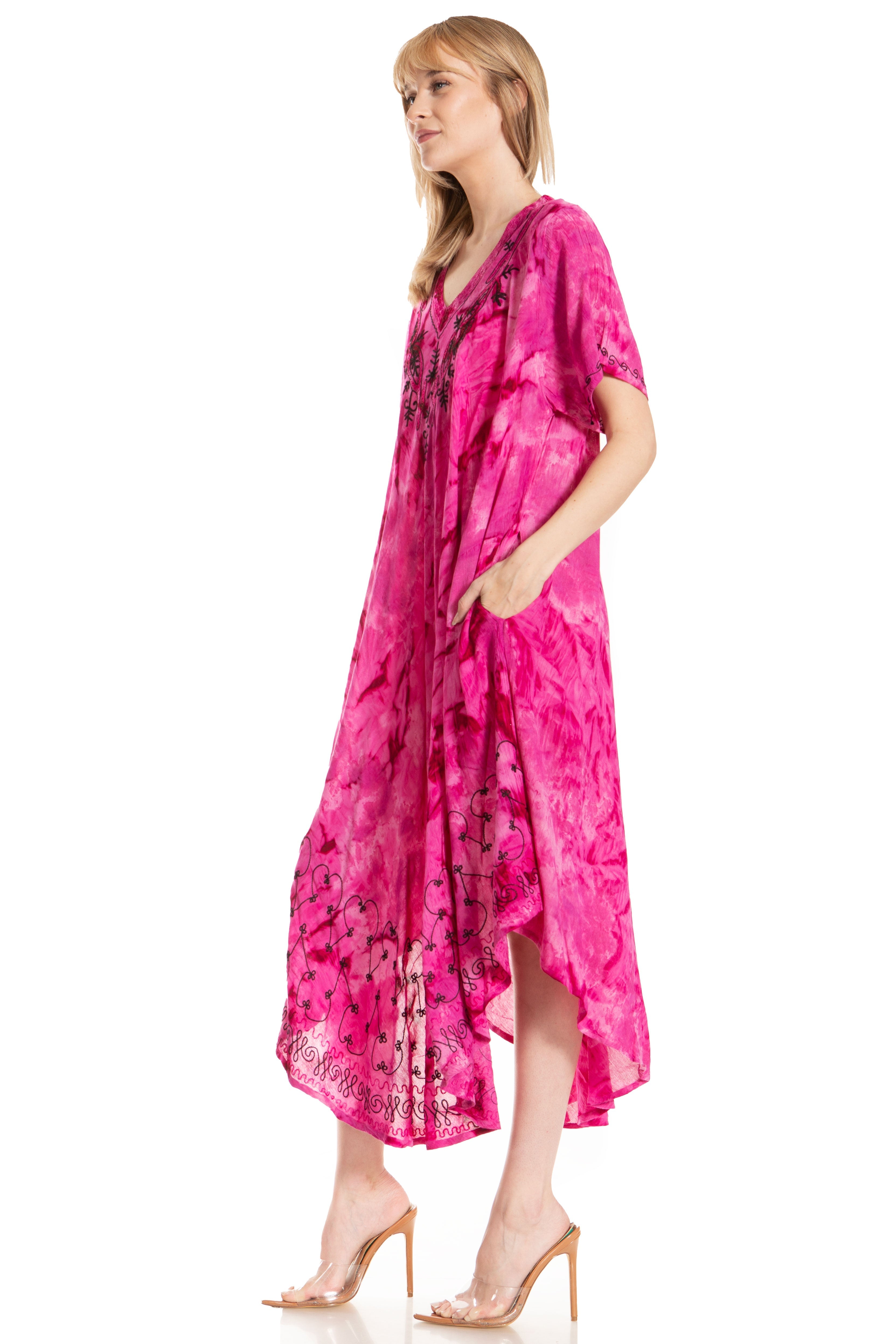 Woman wearing a pink floral dress on a white background