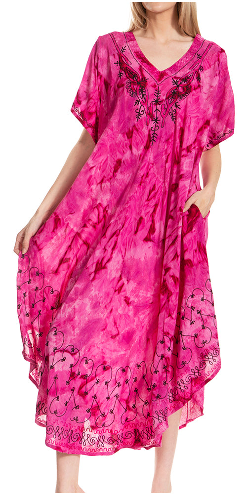 Pink dress with black floral embroidery on a white background