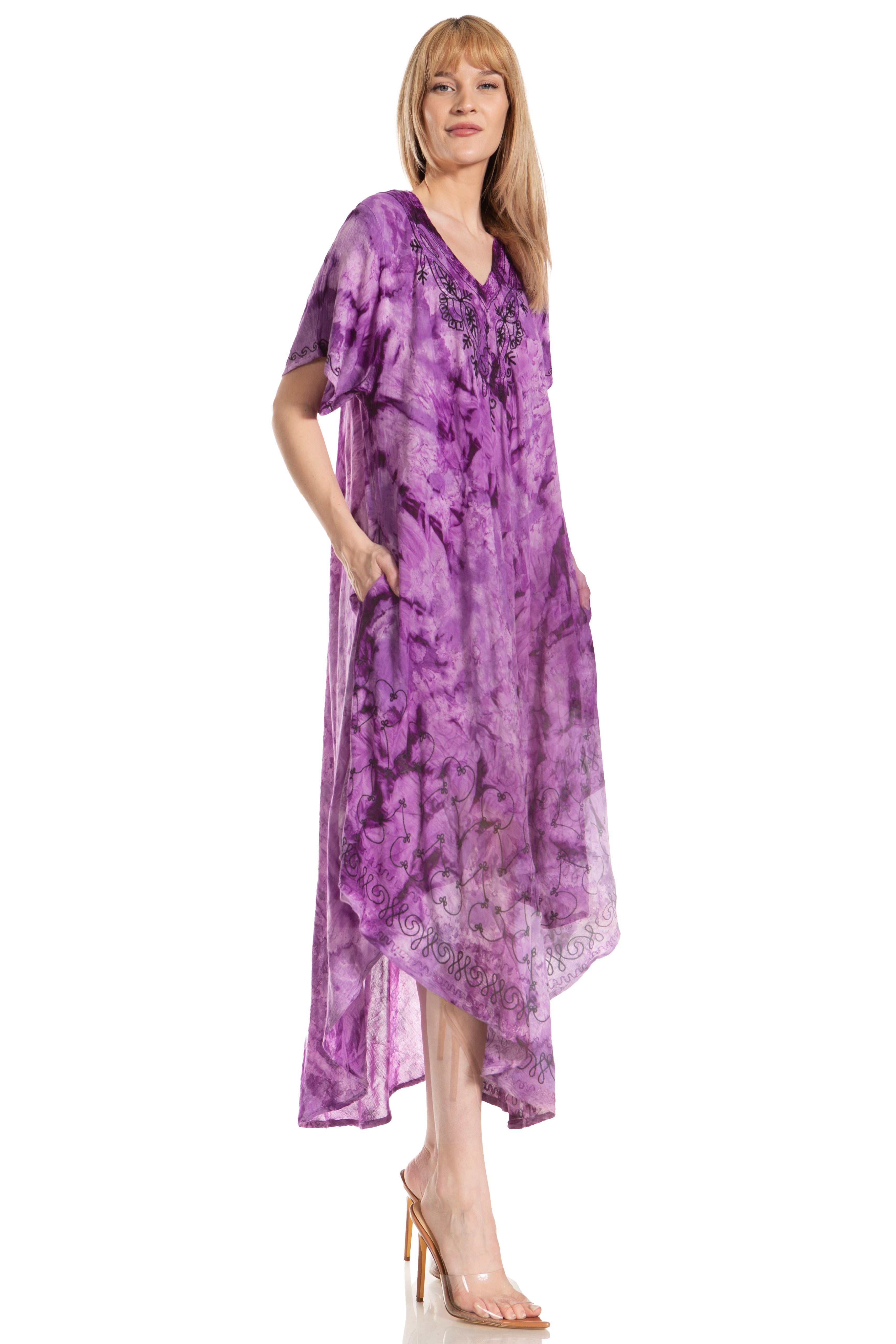 Woman wearing a purple tie-dye dress on a white background