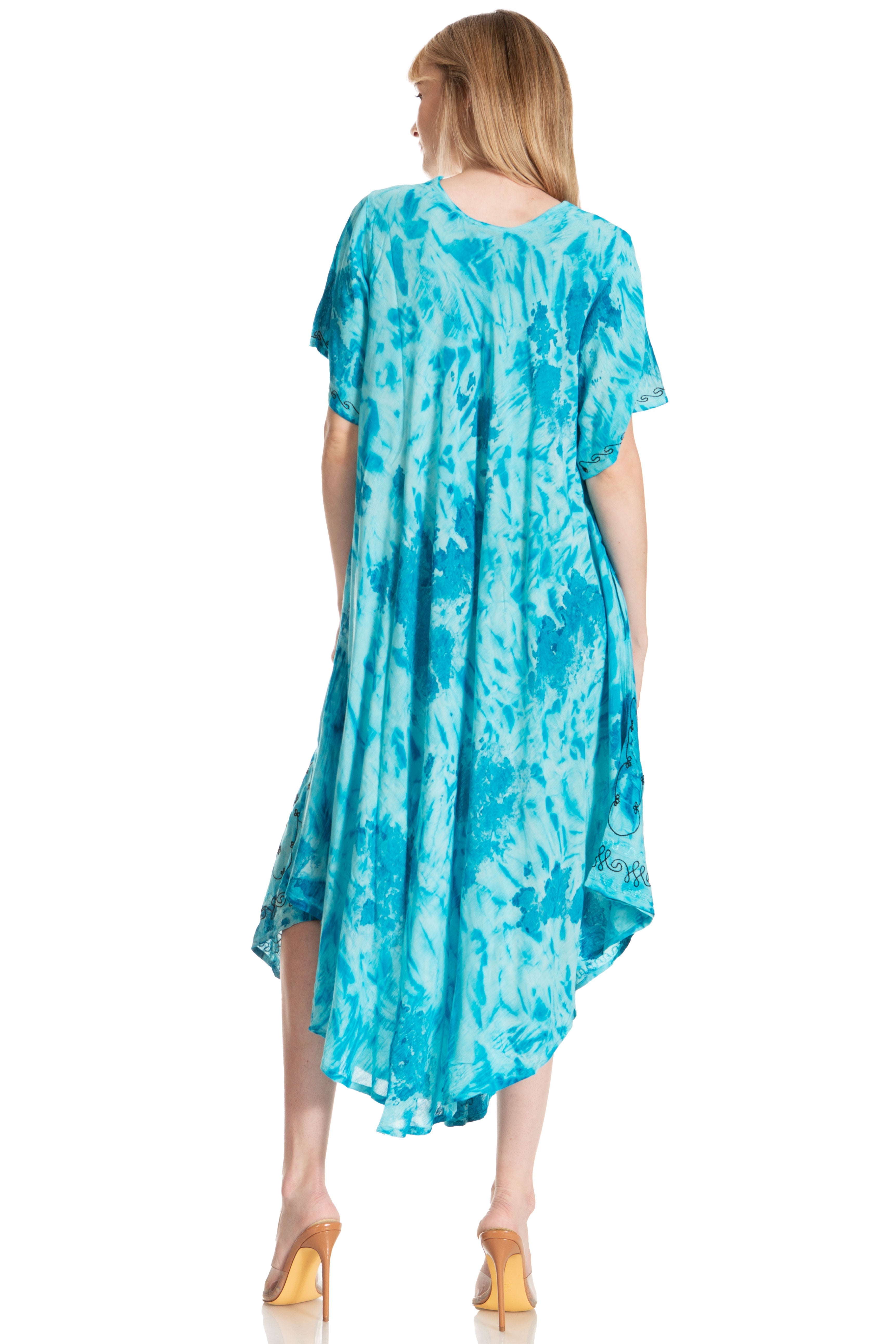Woman wearing a blue tie-dye dress on a white background