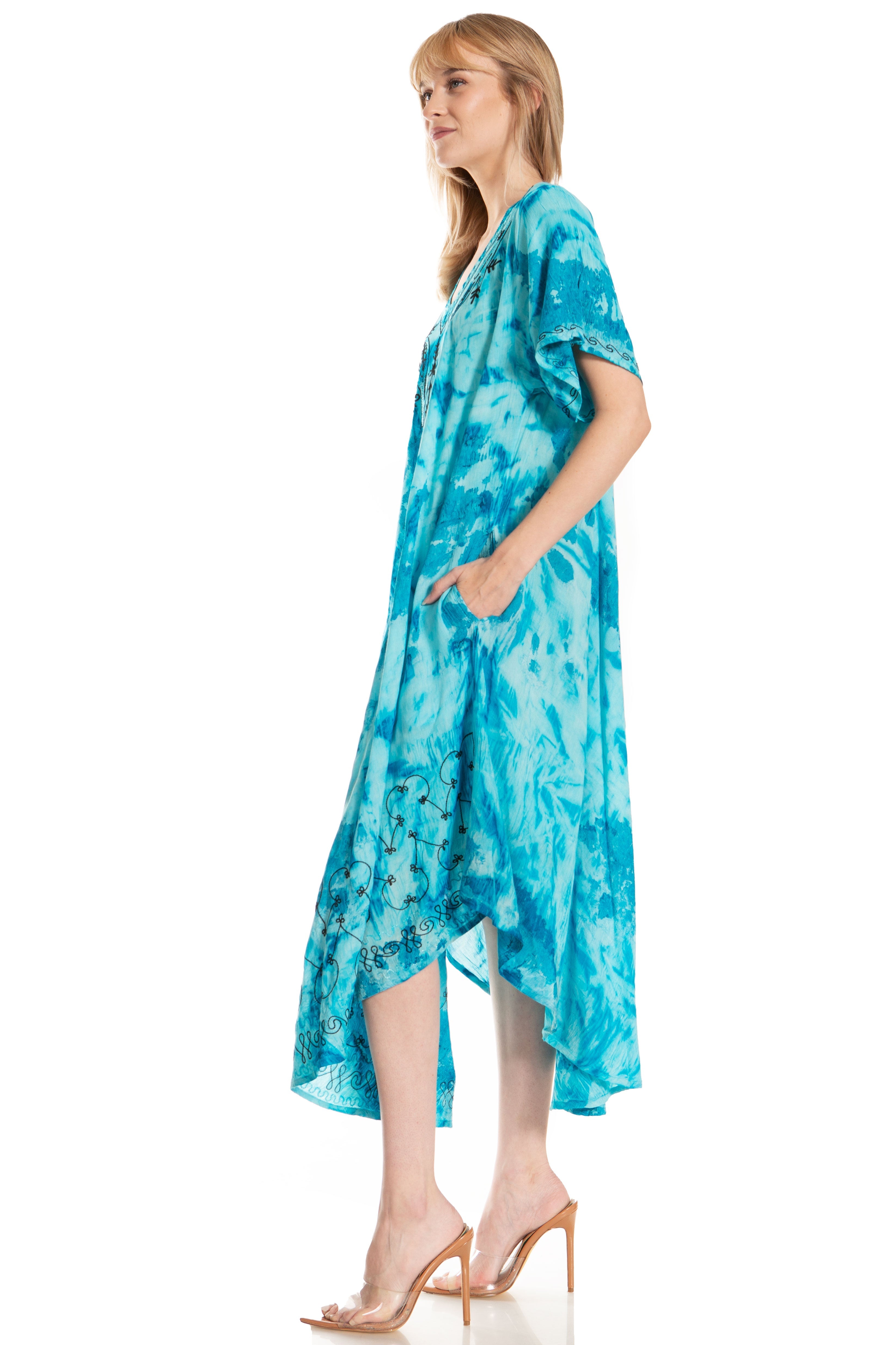 Woman wearing a blue tie-dye dress on a white background