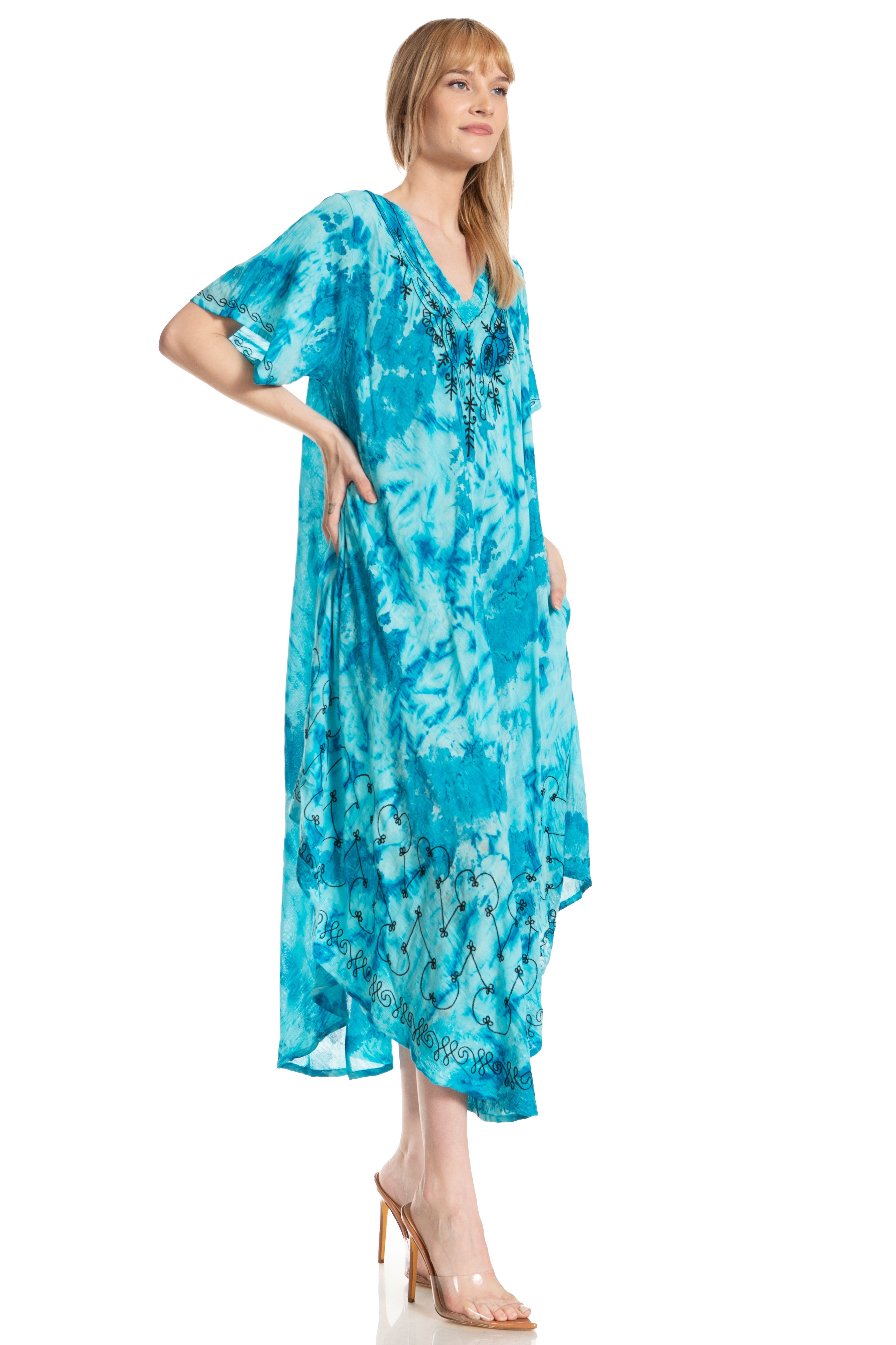 Woman wearing a blue floral dress on a white background