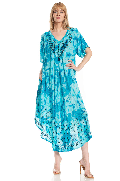 Woman wearing a blue tie-dye dress on a white background