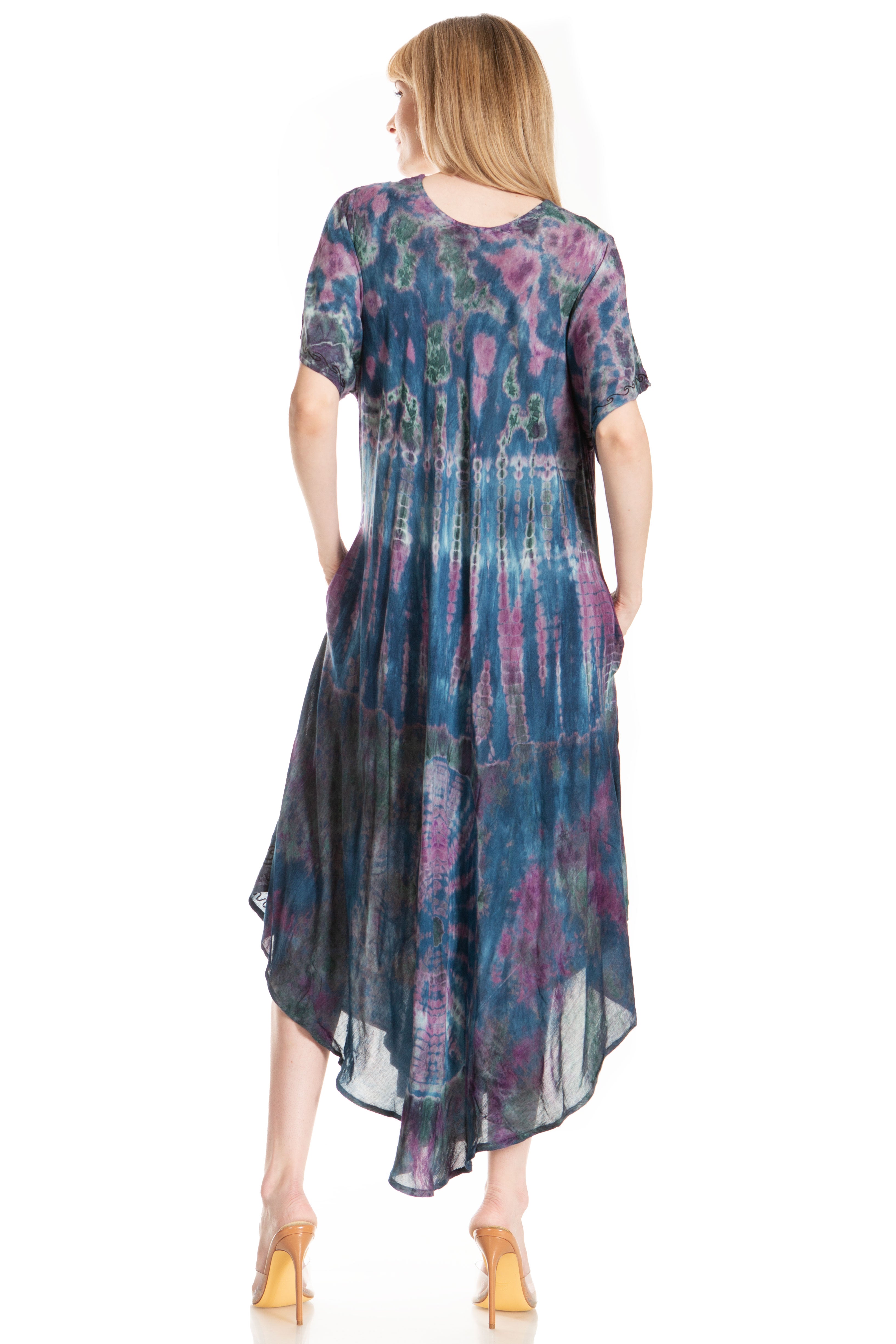 Woman wearing a colorful dress with a white background