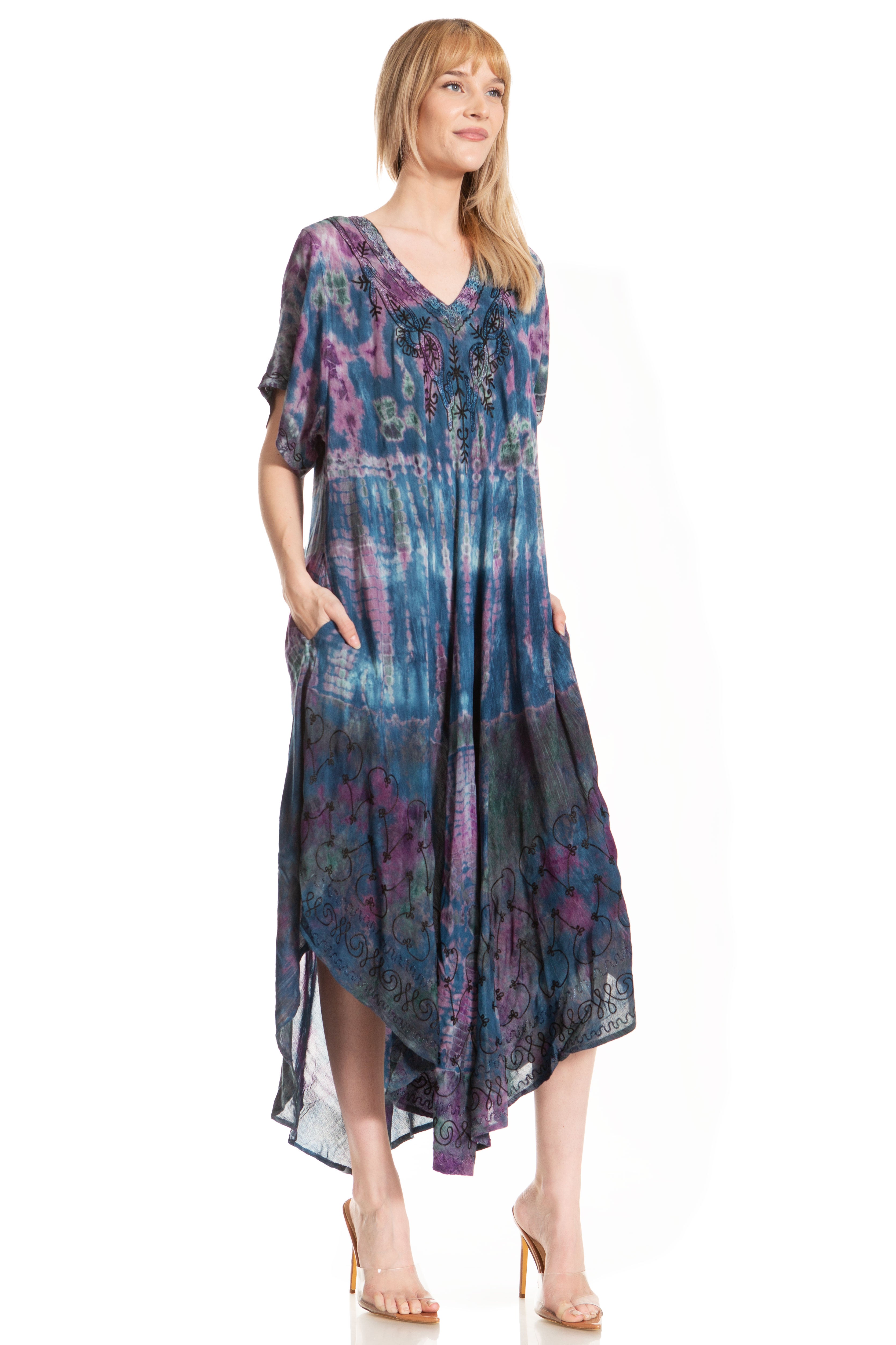 Woman wearing a patterned dress on a white background
