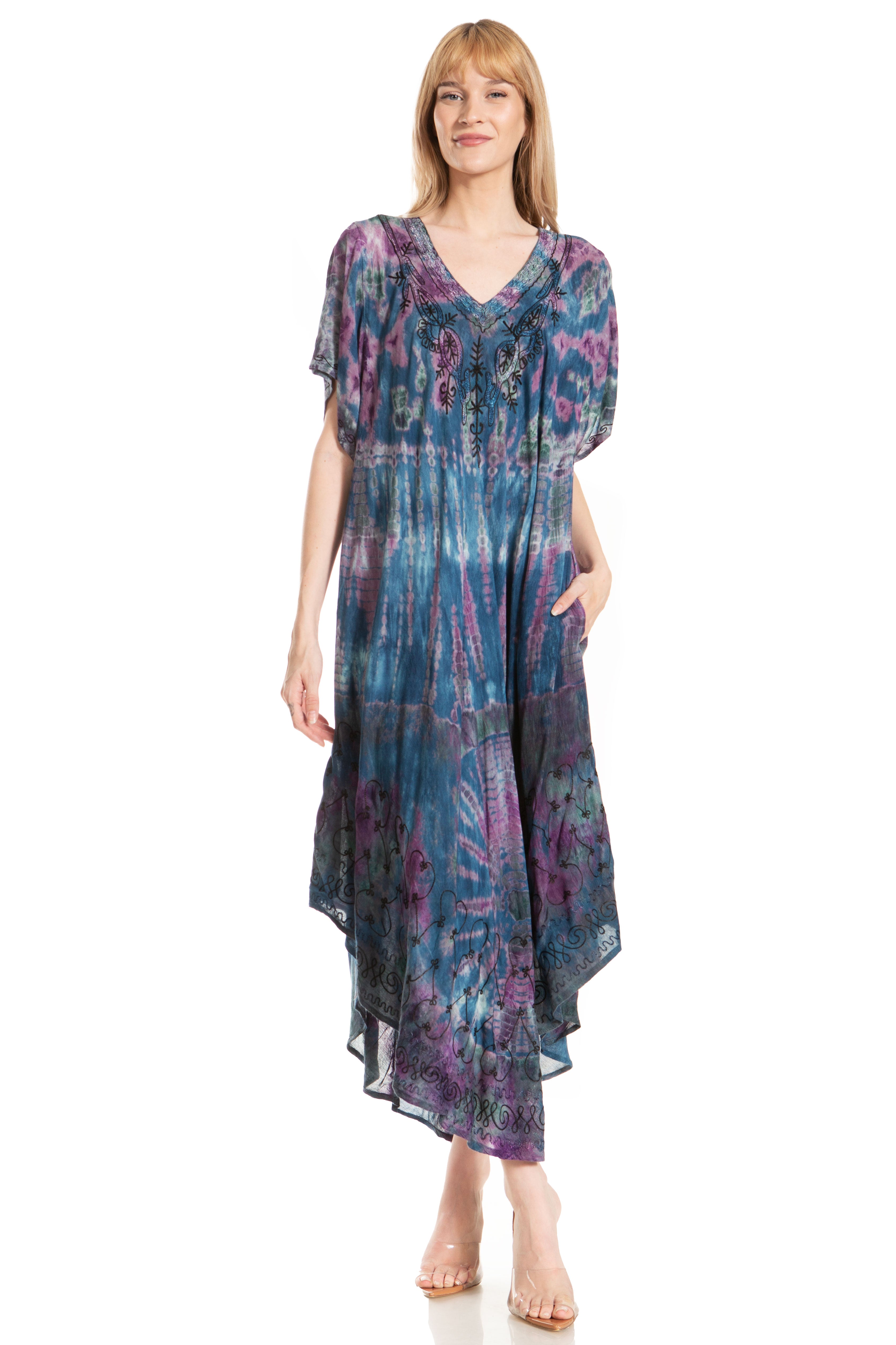 Woman wearing a blue and purple patterned dress on a white background