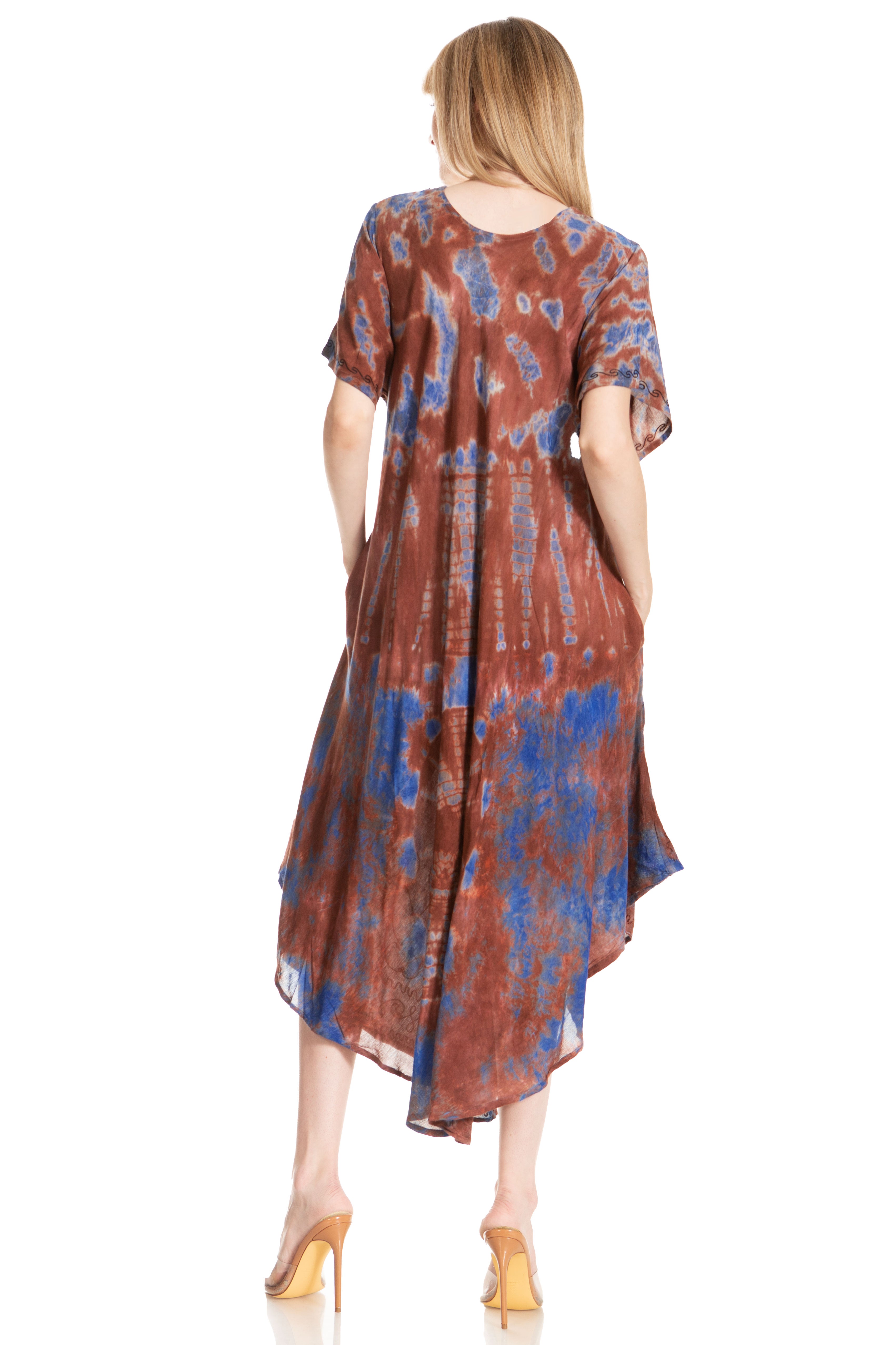 Woman wearing a patterned dress on a white background