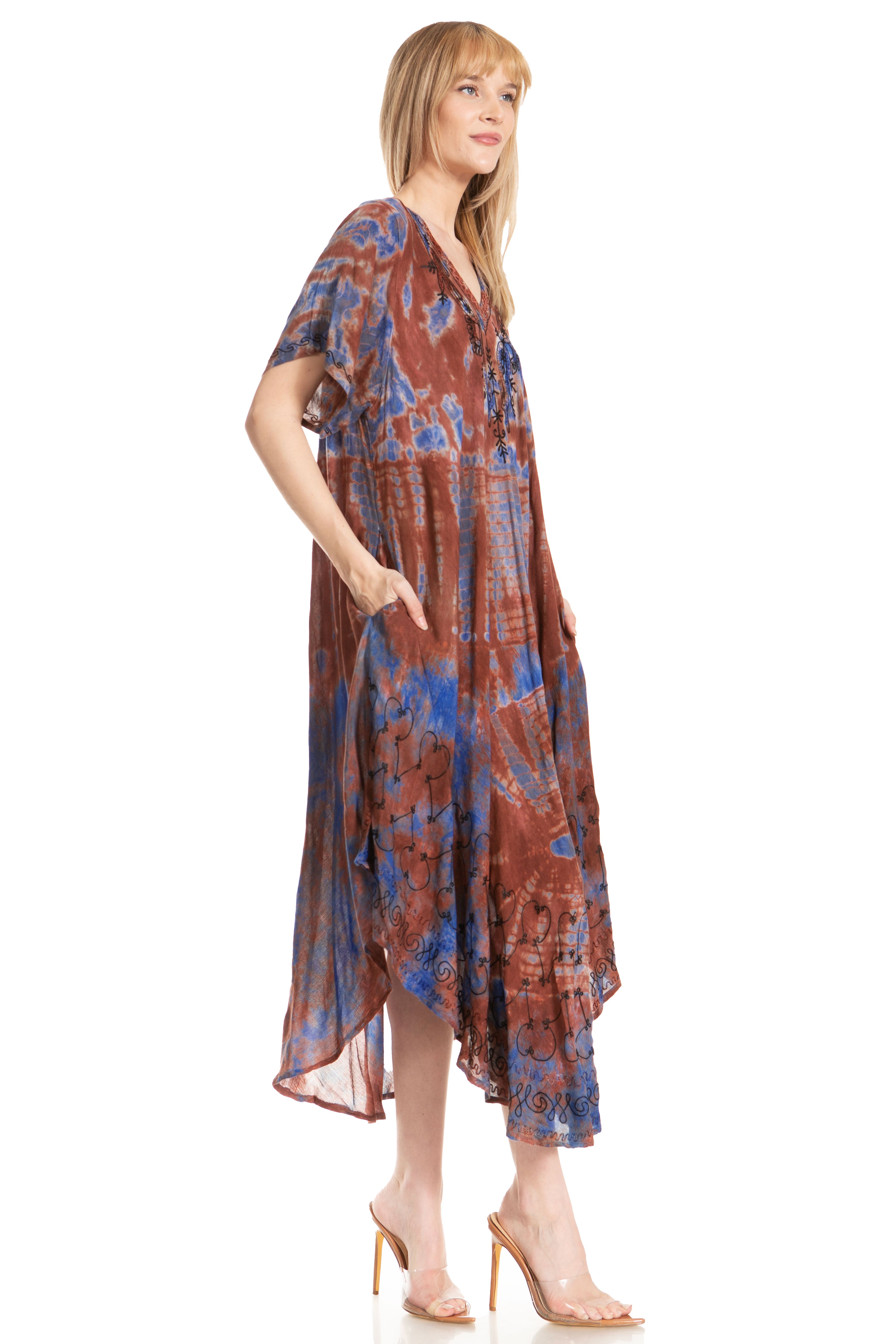 Woman wearing a patterned dress on a white background