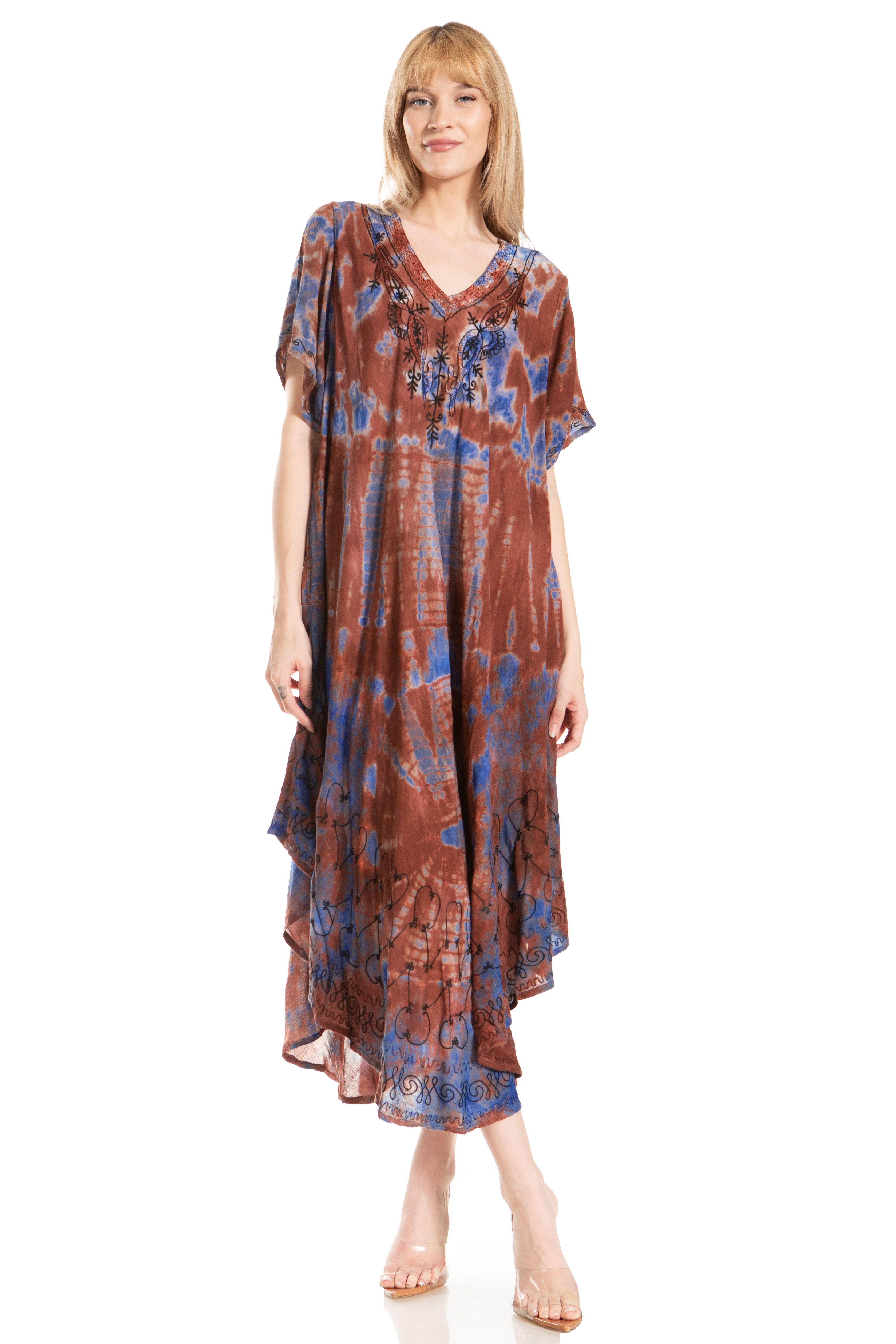 Woman wearing a patterned dress on a white background
