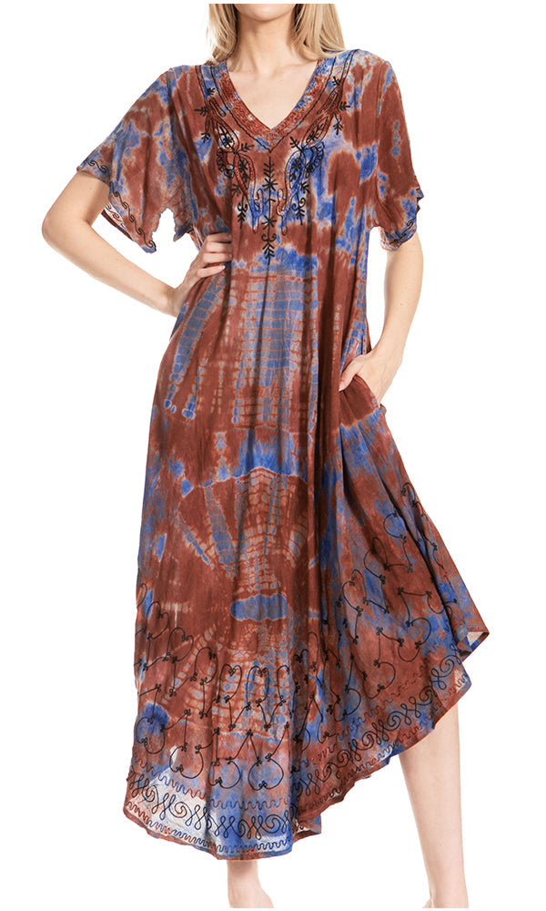 Woman wearing a patterned dress on a white background