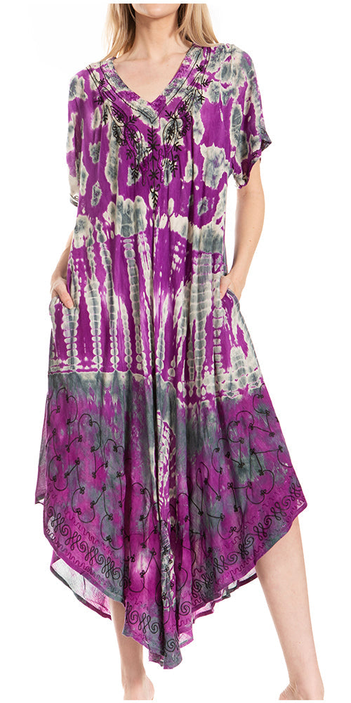 Woman wearing a purple and green patterned dress on a white background