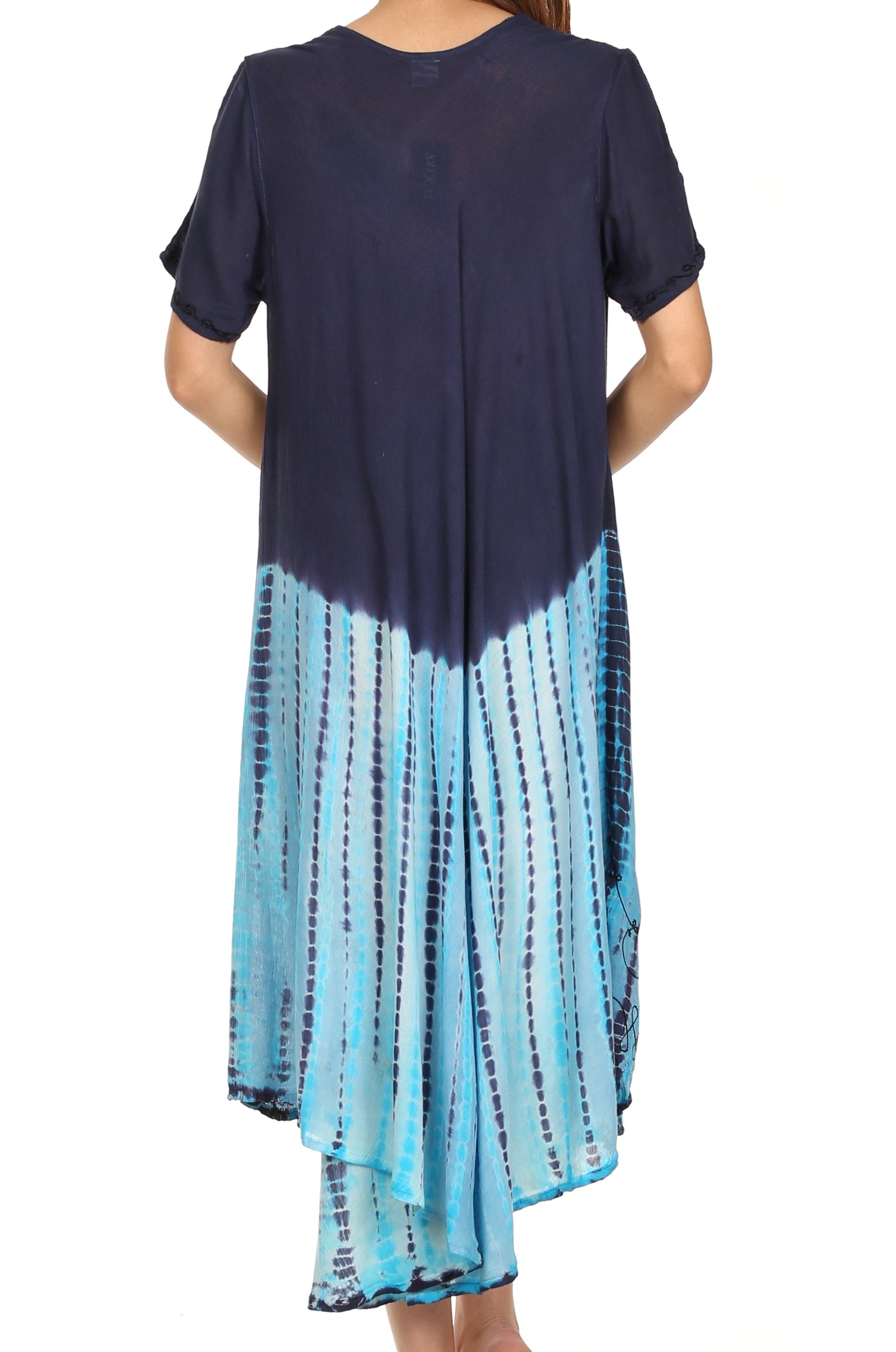 Navy blue and blue tie-dye dress worn by a person on a white background