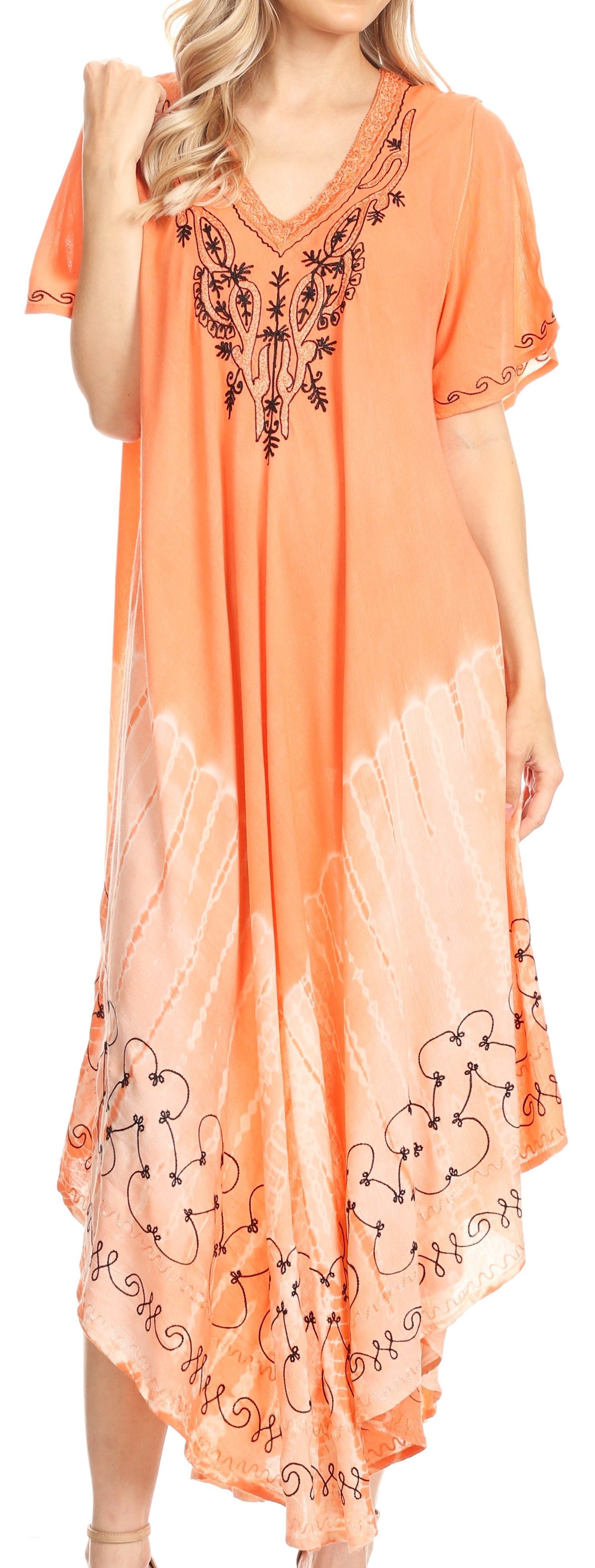 Orange dress with floral embroidery on a plain background