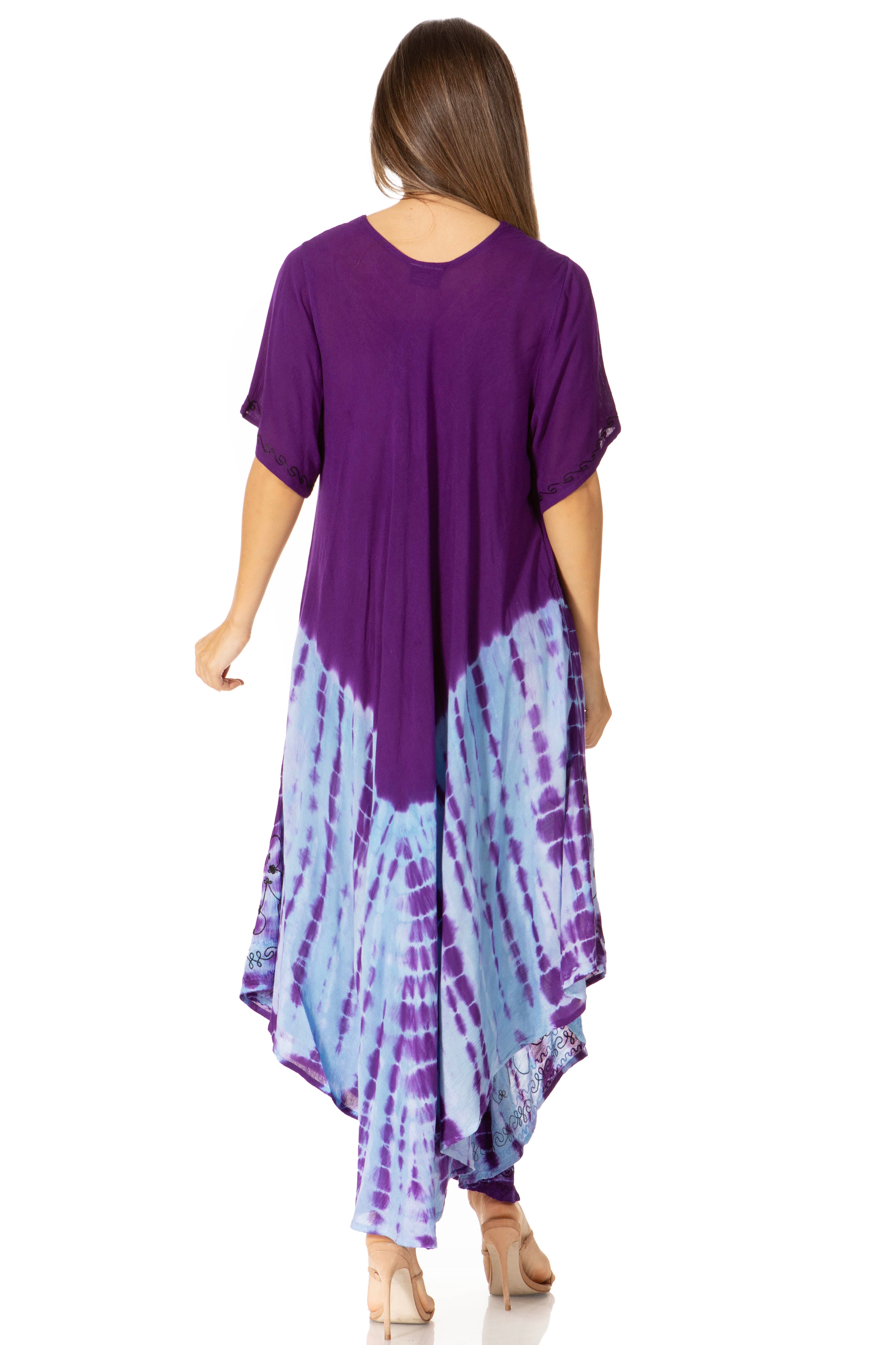 Woman wearing a purple and blue tie-dye dress on a white background
