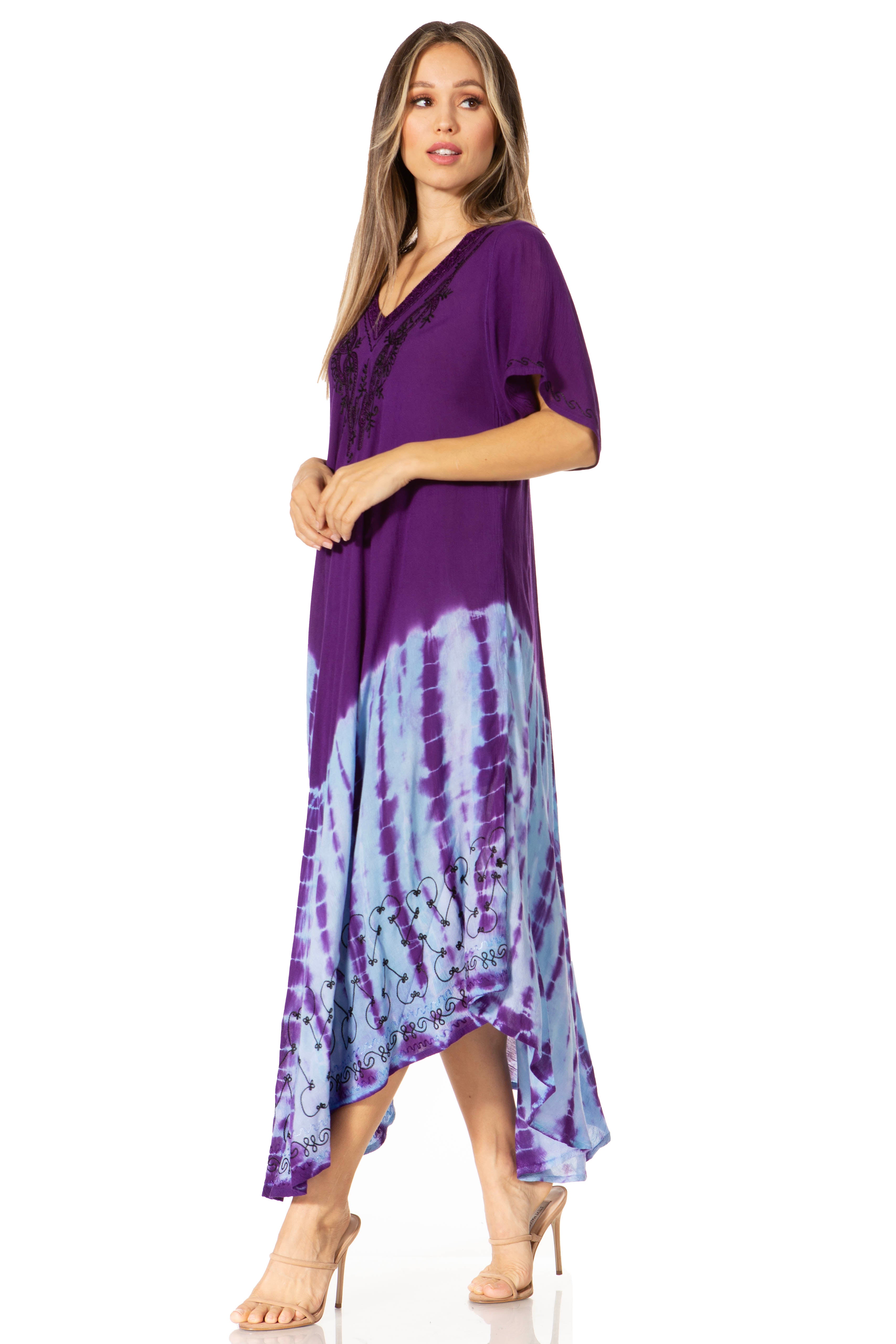 Woman wearing a purple and blue tie-dye dress on a white background