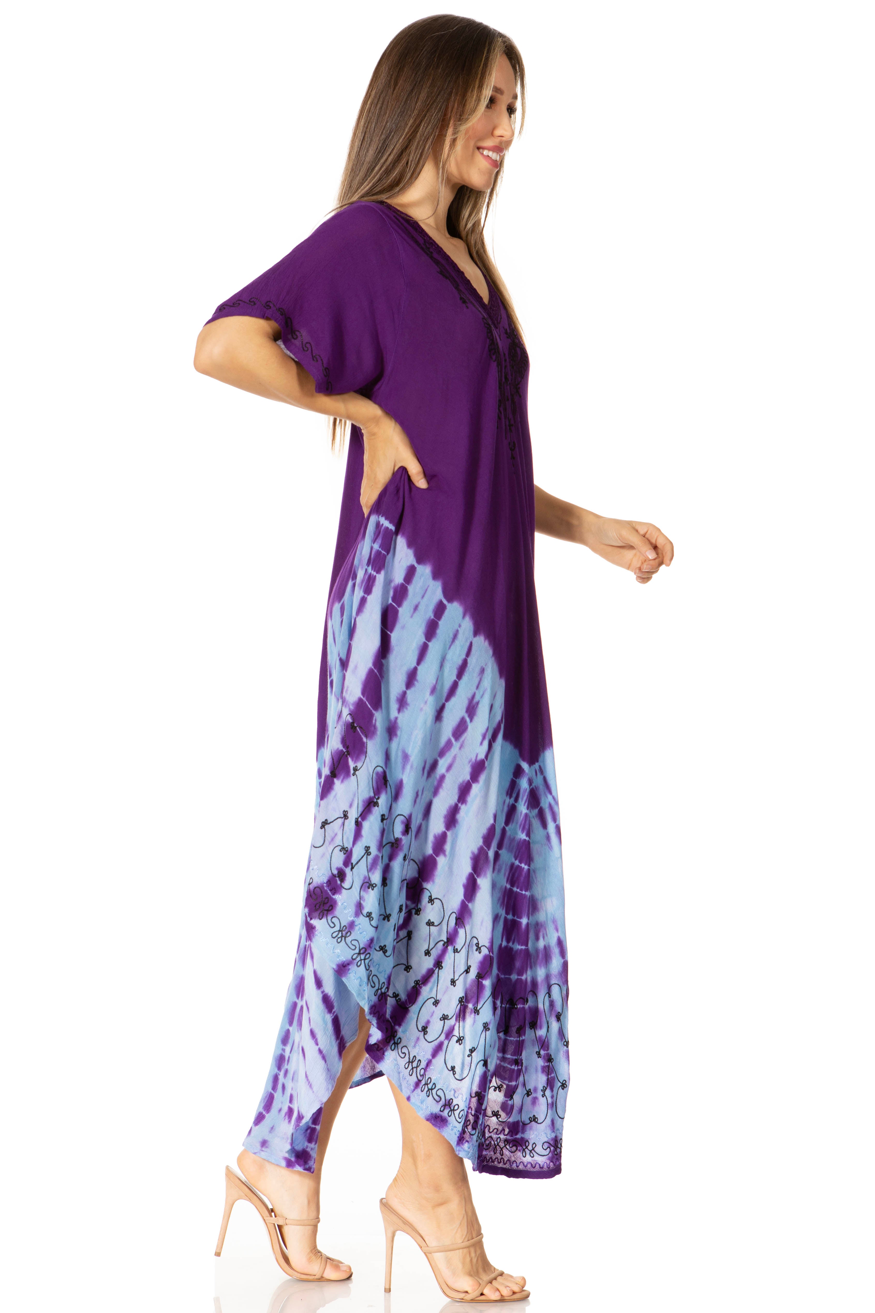 Woman wearing a purple tie-dye dress on a white background