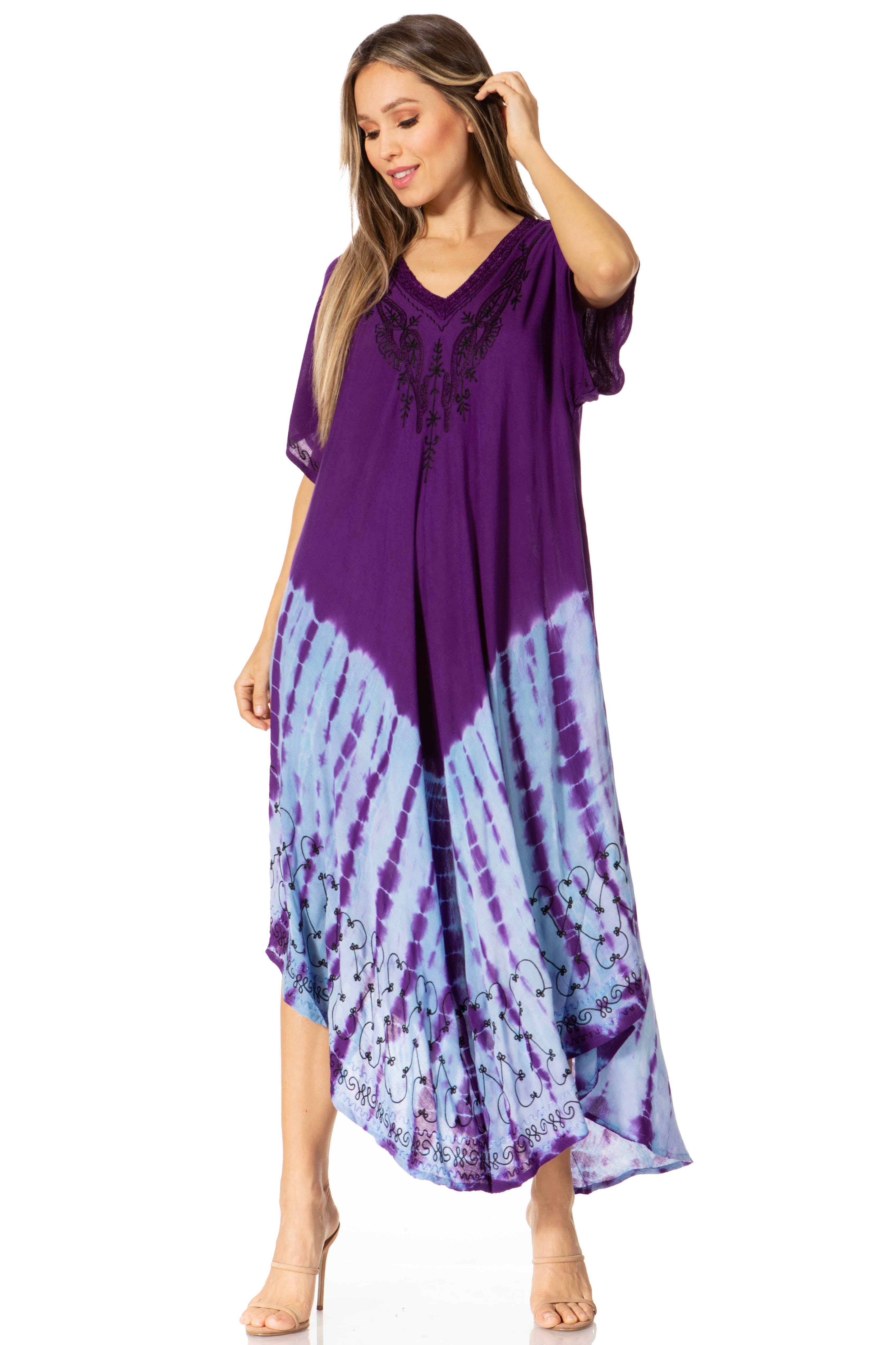 Woman wearing a purple and blue tie-dye dress on a white background