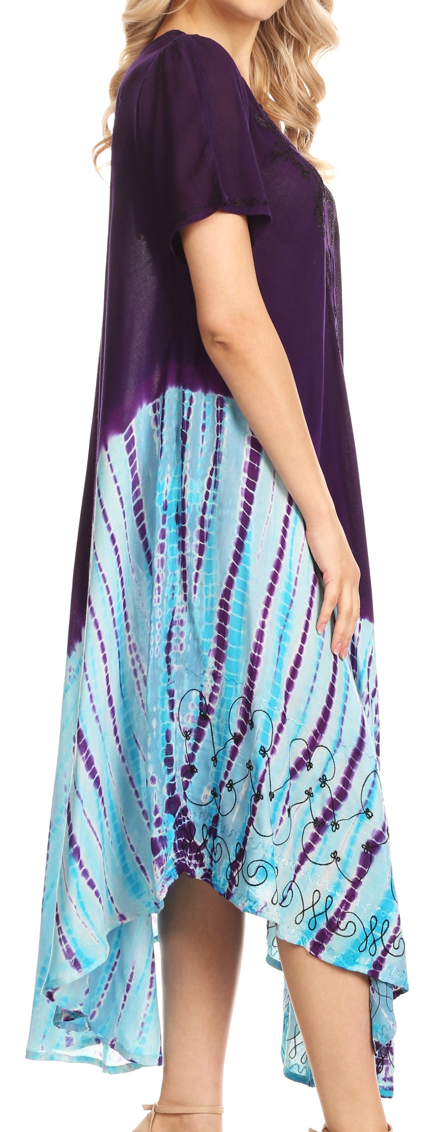 Woman wearing a purple and blue tie-dye dress on a white background