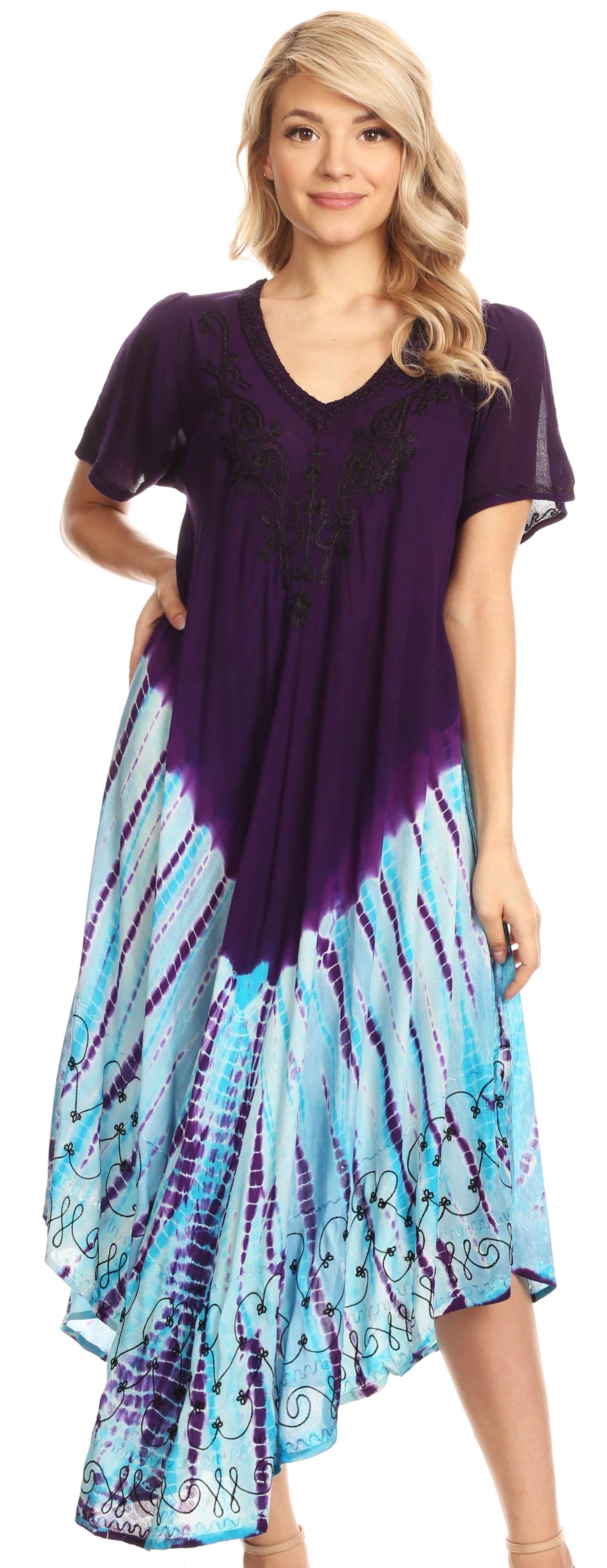 Woman wearing a purple and blue tie-dye dress on a white background