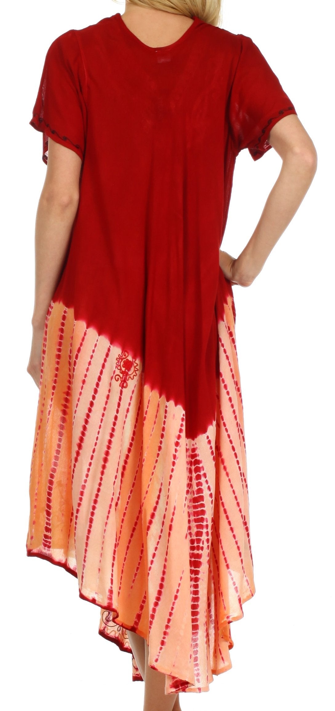 Red and orange tie-dye dress worn by a person on a white background