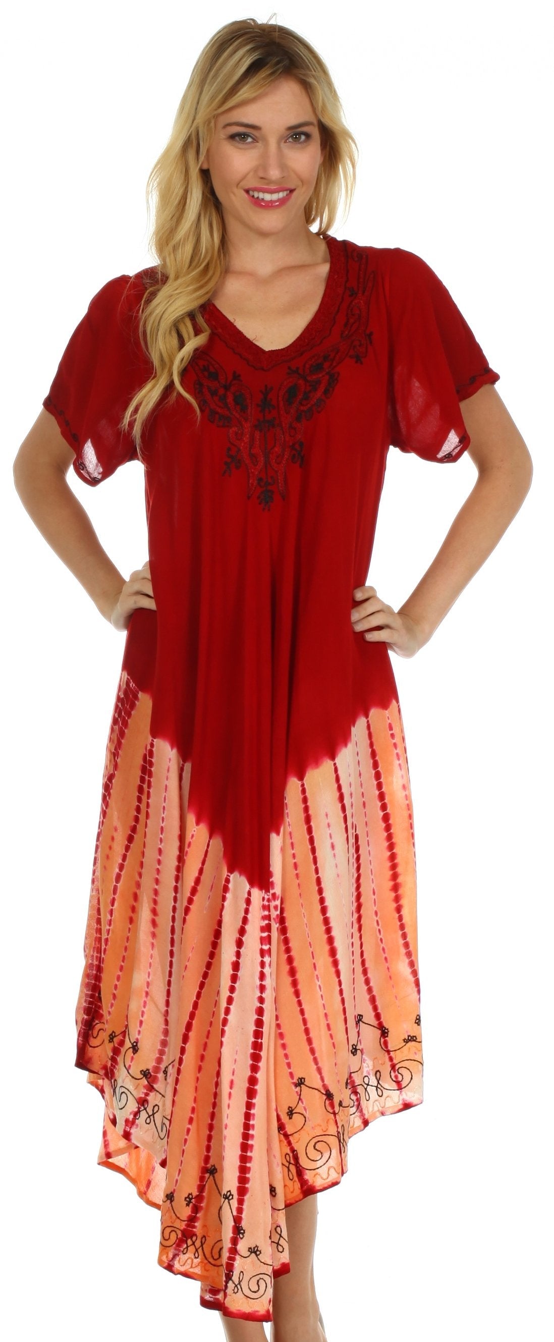 Woman wearing a red and orange dress with floral patterns on a white background