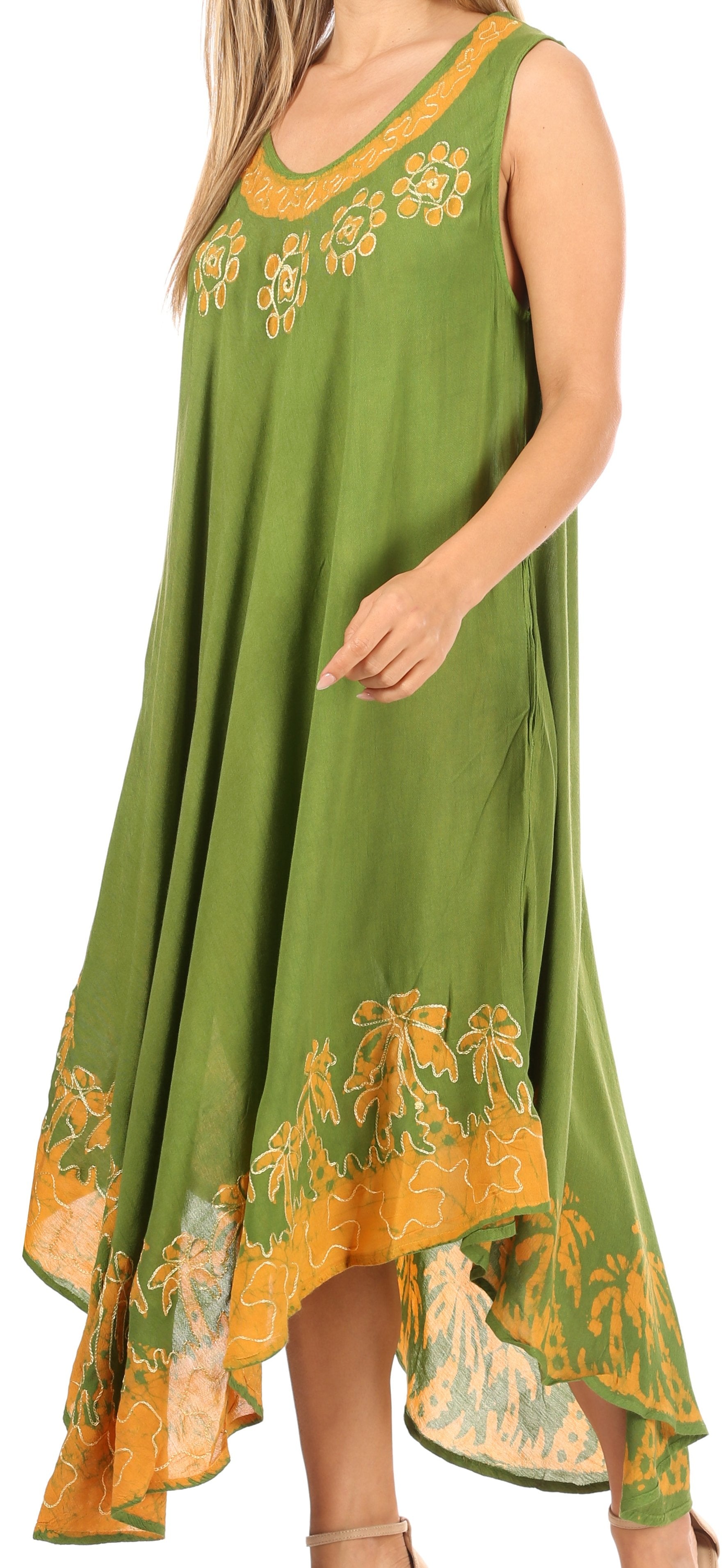 Green dress with yellow floral patterns on a white background
