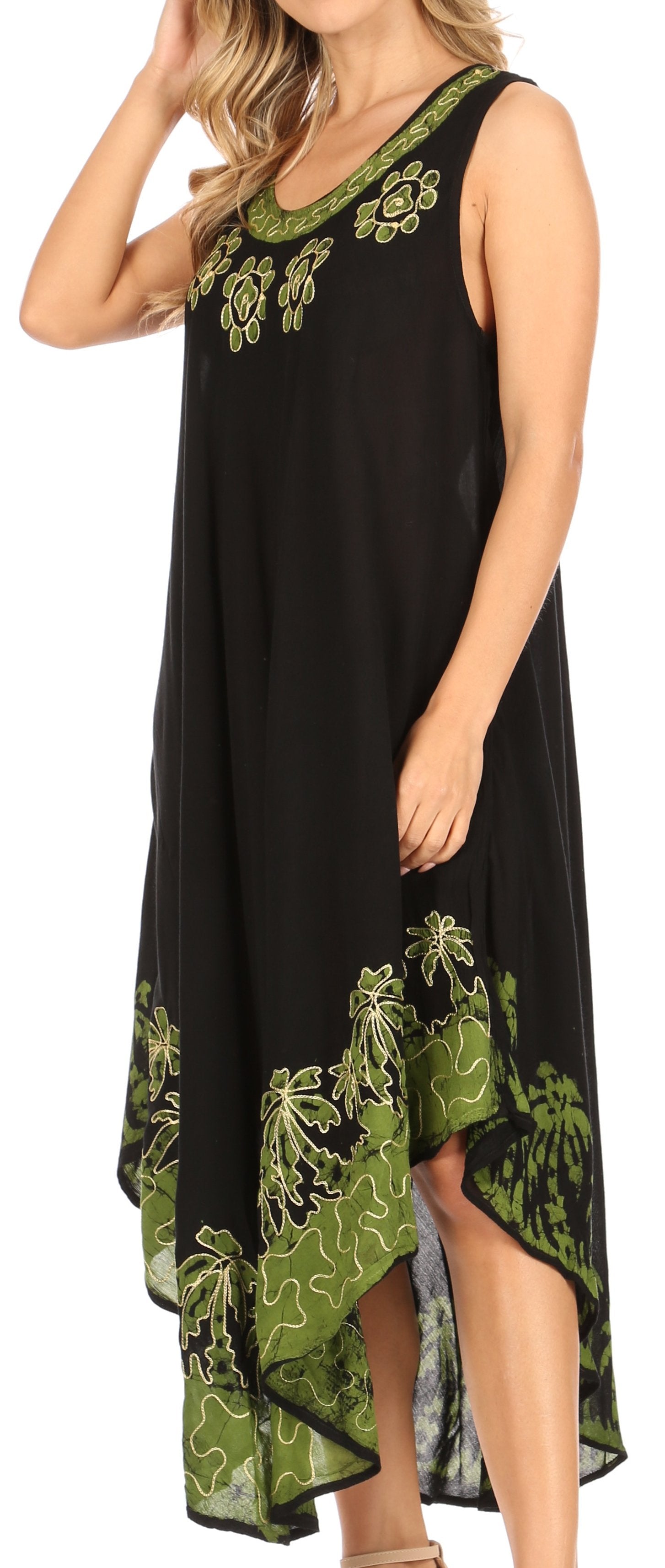 Black dress with green floral embroidery on a white background