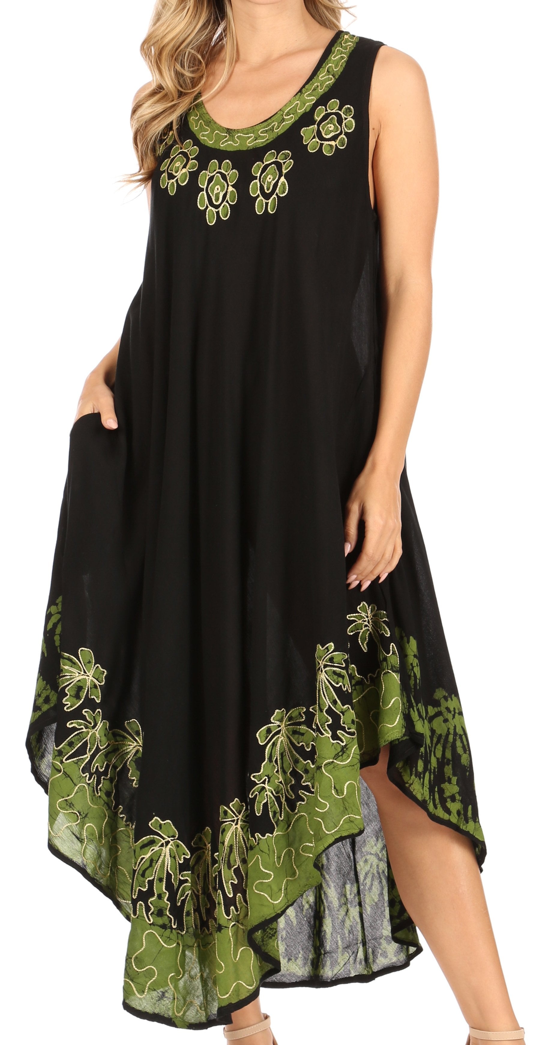 Black dress with green floral embroidery on a white background