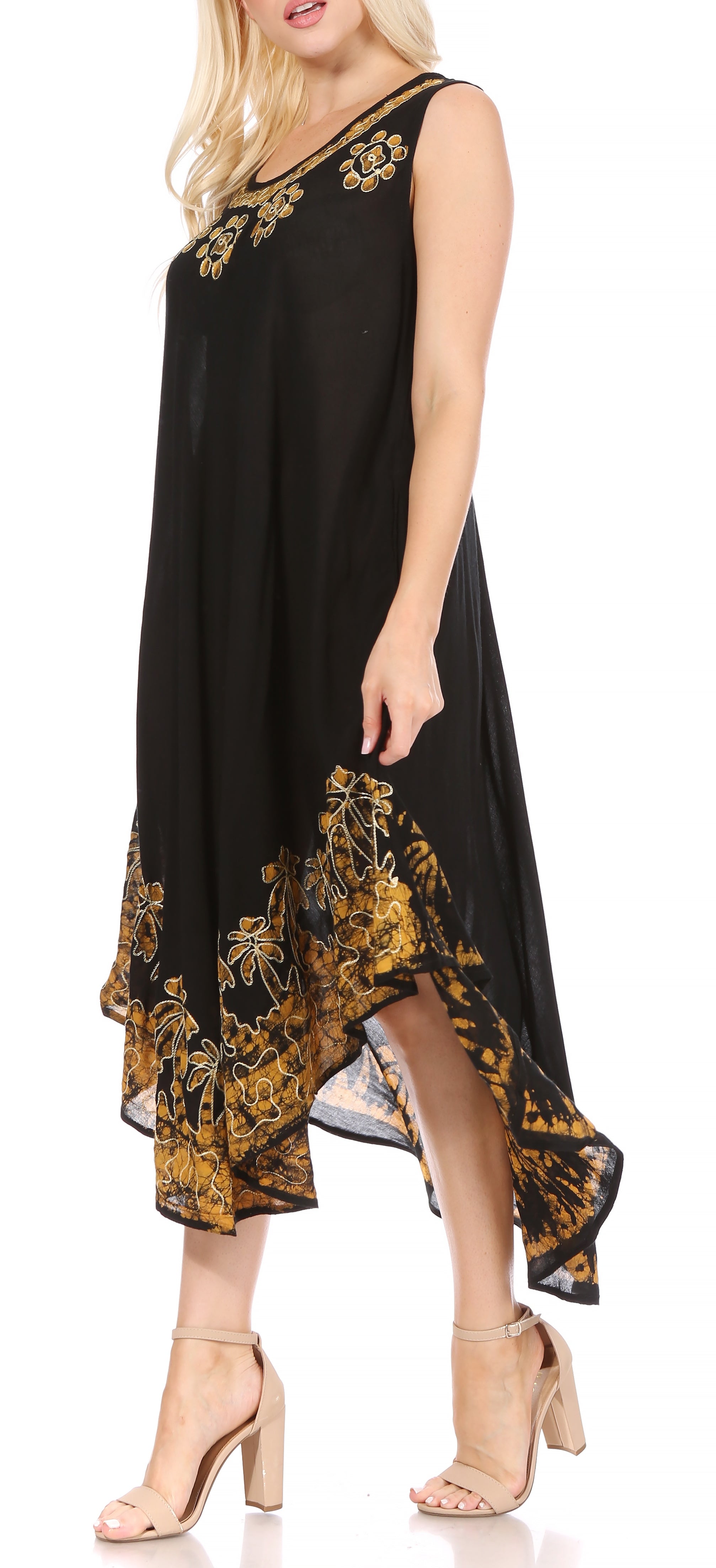 Black dress with gold floral embroidery on a white background