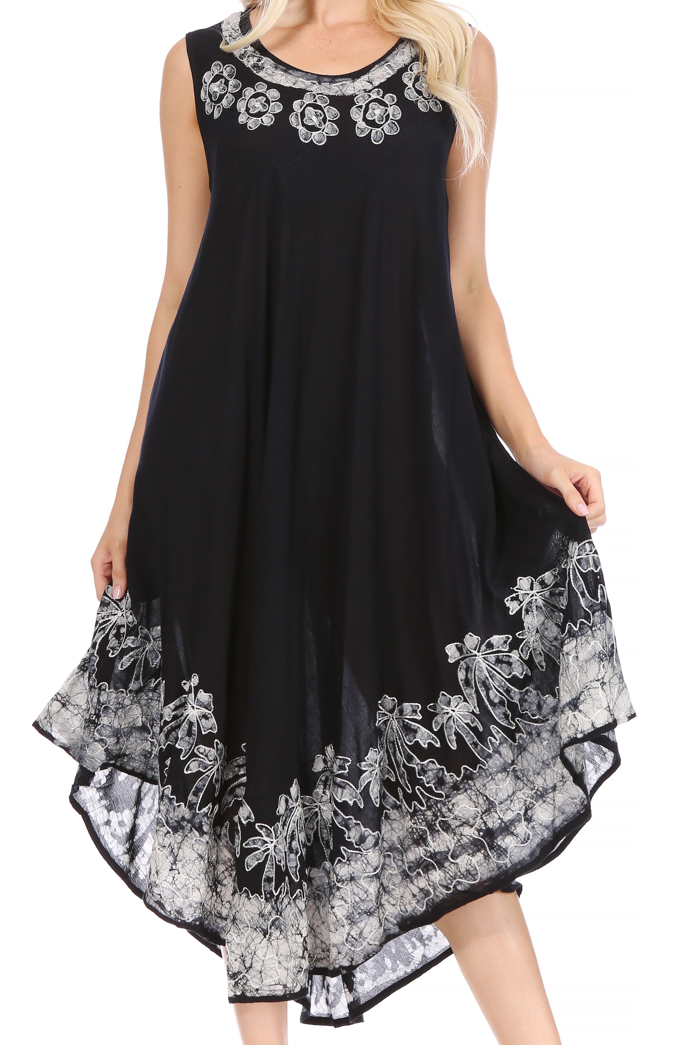 Black dress with white floral embroidery on a white background