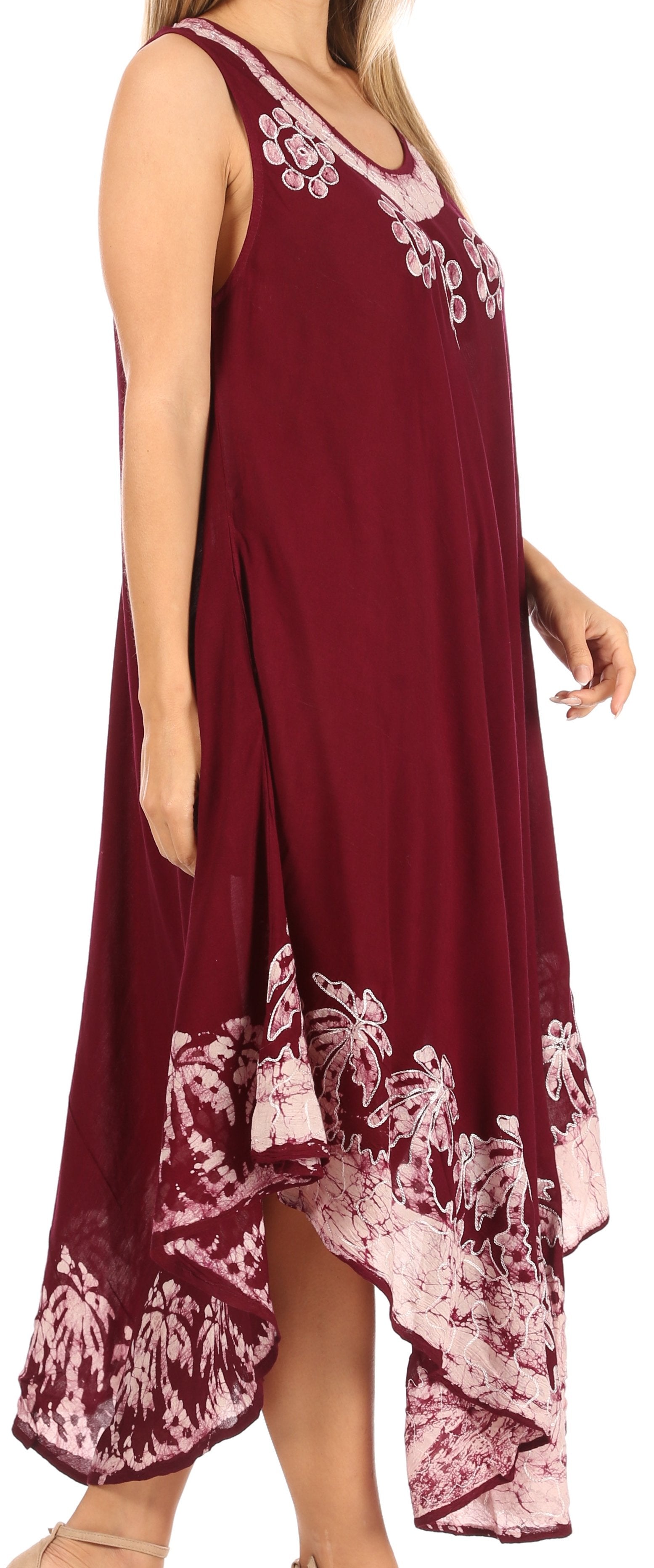 Maroon dress with floral embroidery and hem design on a plain background