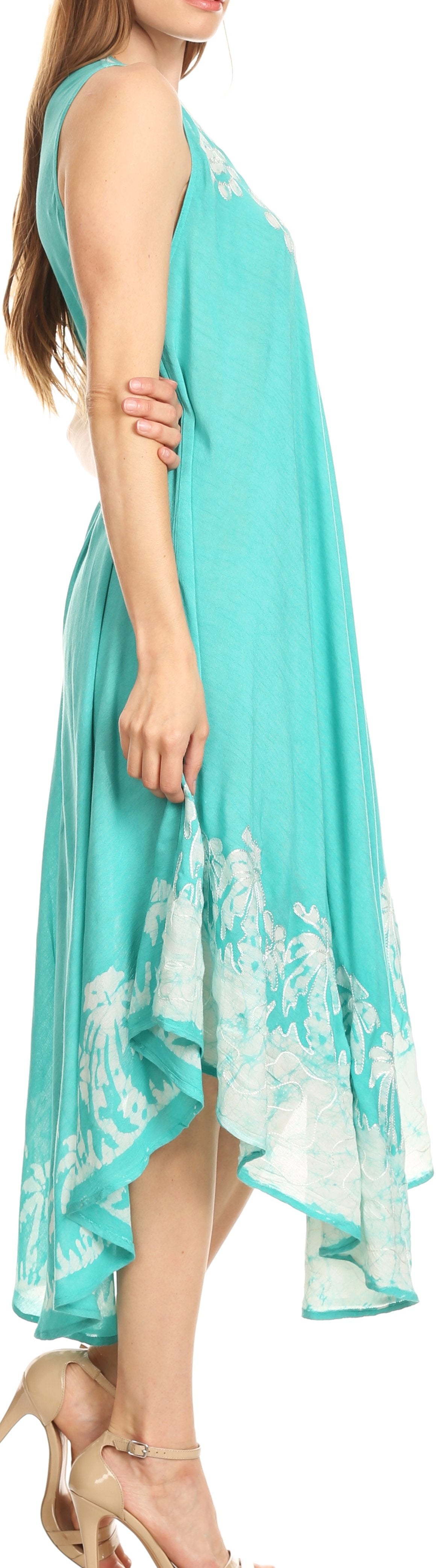 Turquoise dress with floral patterns on a white background