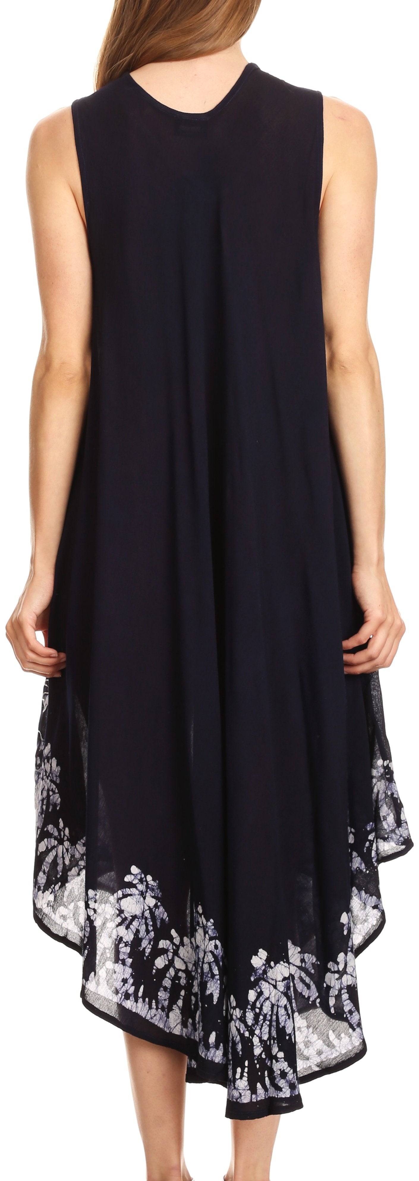 Black sleeveless dress with white floral pattern on a plain background