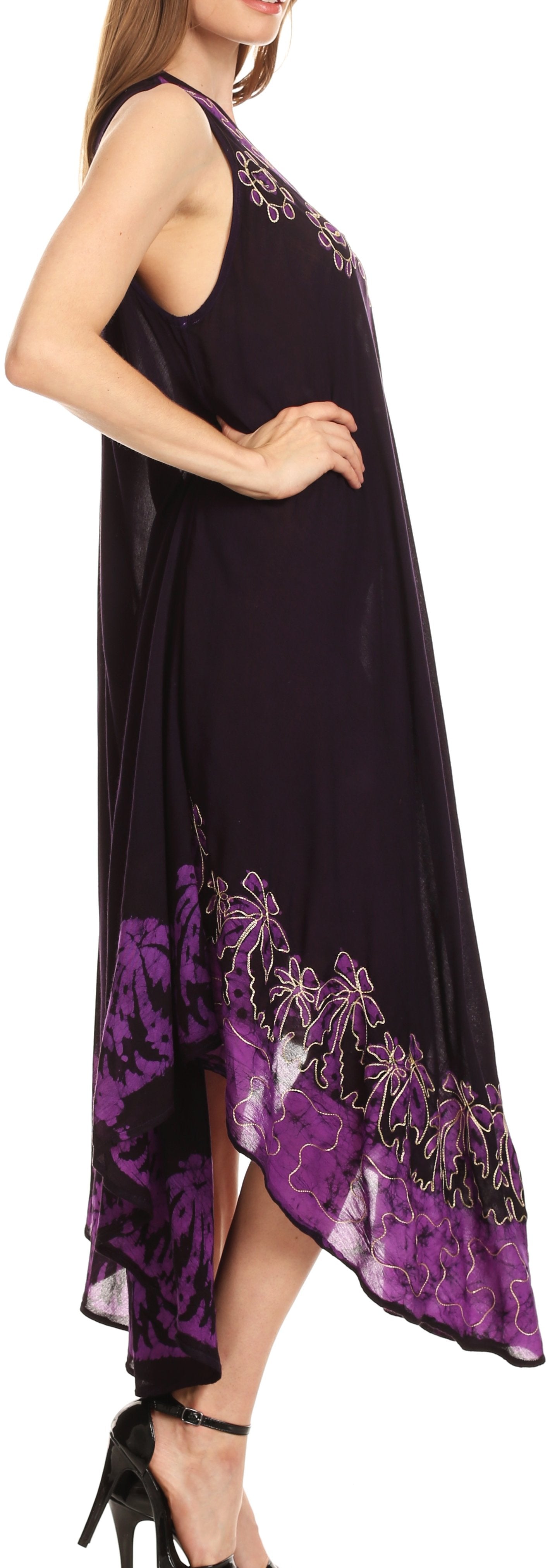 Woman wearing a black dress with purple floral patterns