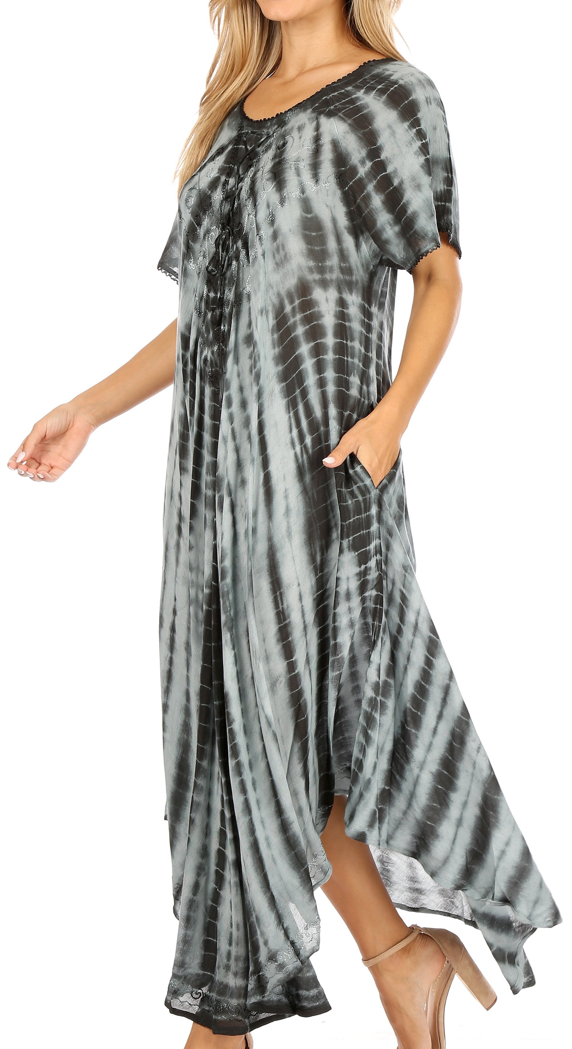 Woman wearing a tie-dye dress on a white background