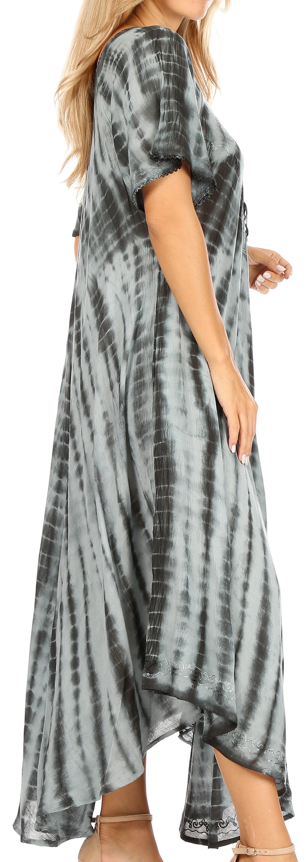 Tie-dye dress worn by a model on a plain background