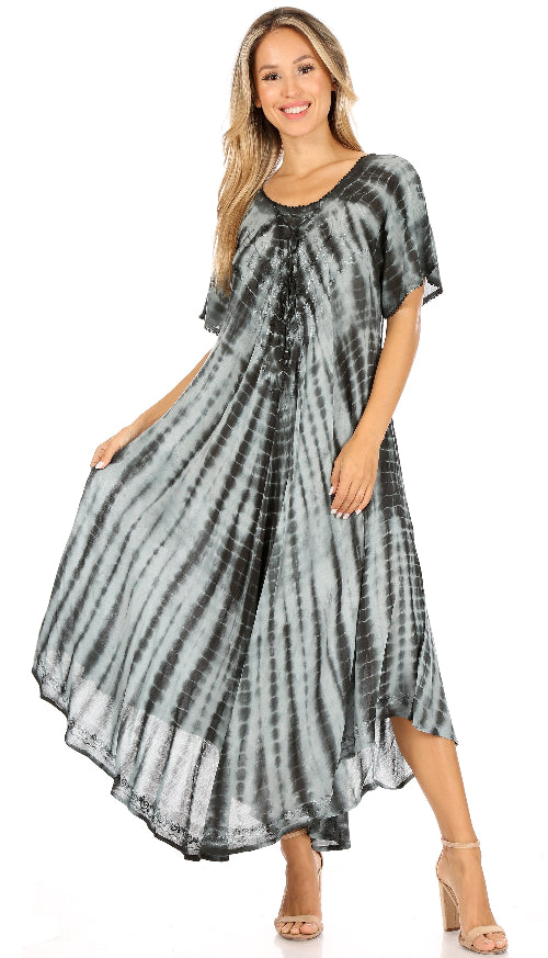 Woman wearing a tie-dye dress on a white background