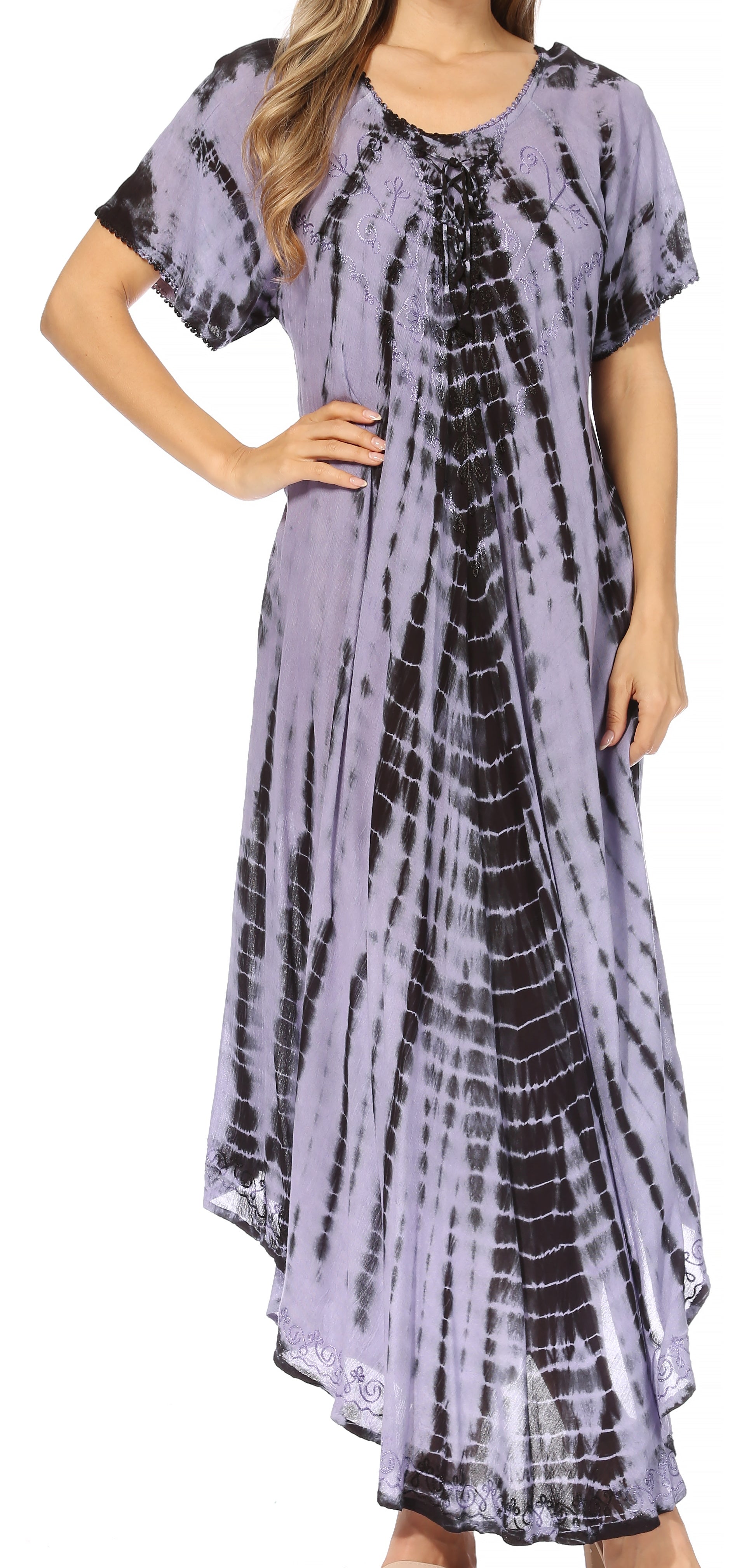 Woman wearing a tie-dye dress with a white background