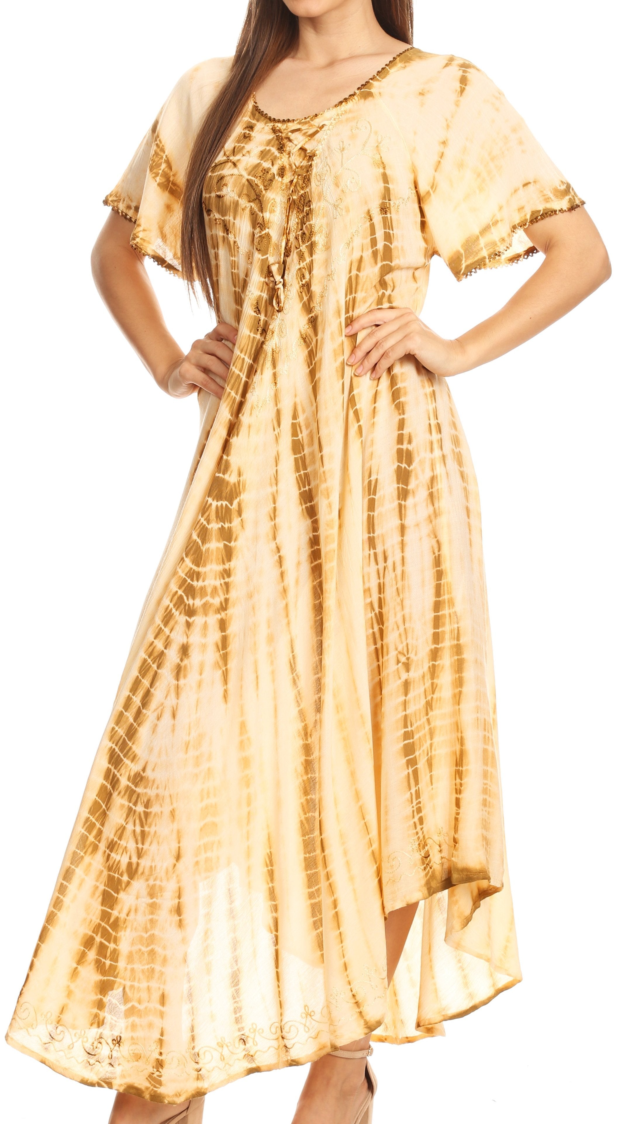 Woman wearing a yellow tie-dye dress on a white background