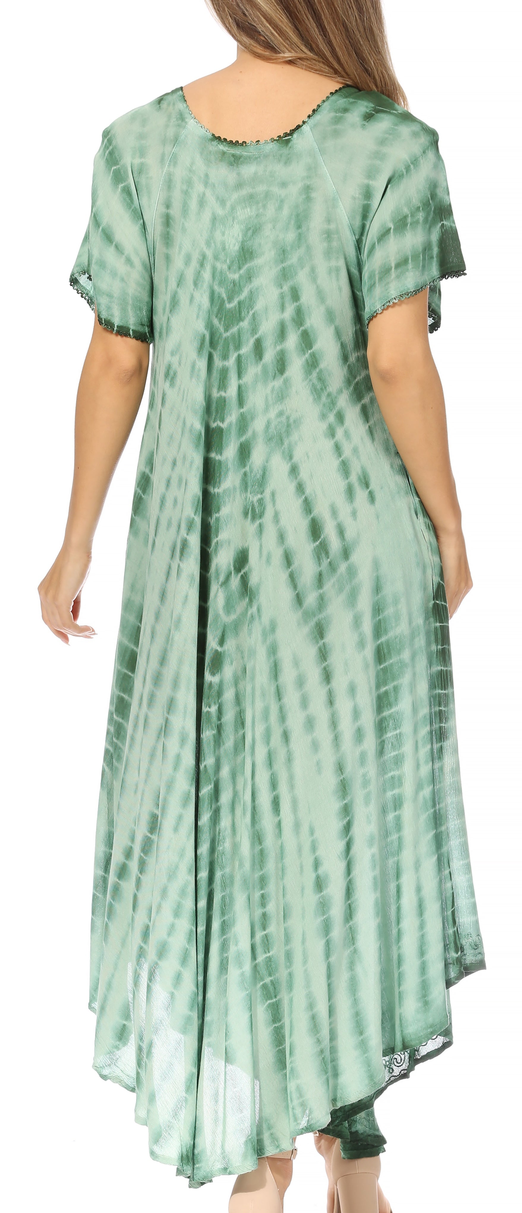 Green tie-dye dress worn by a person on a white background