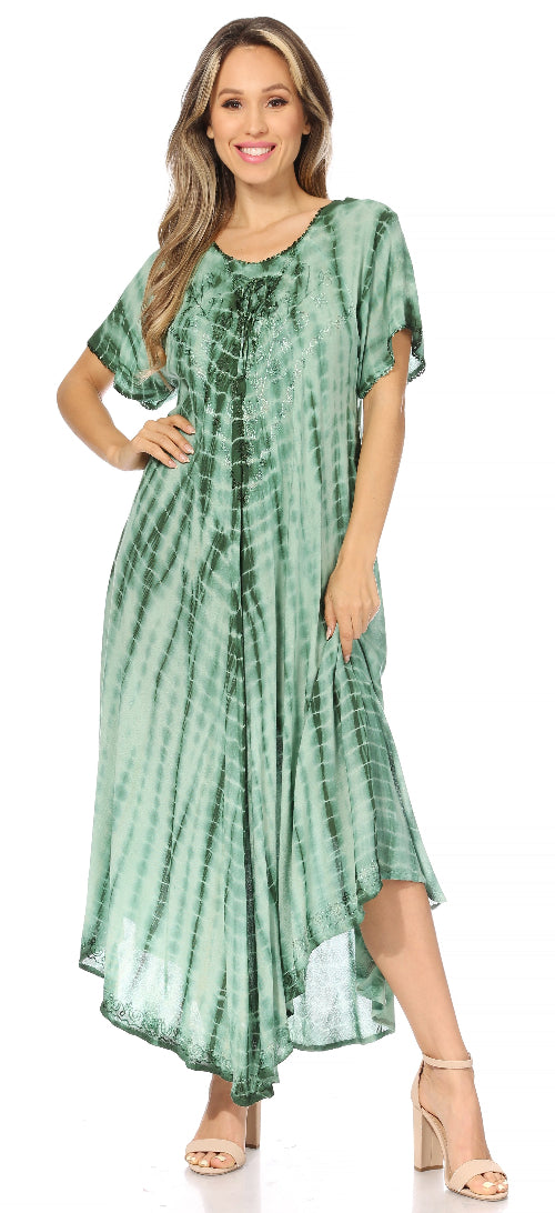 Woman wearing a green tie-dye dress on a white background