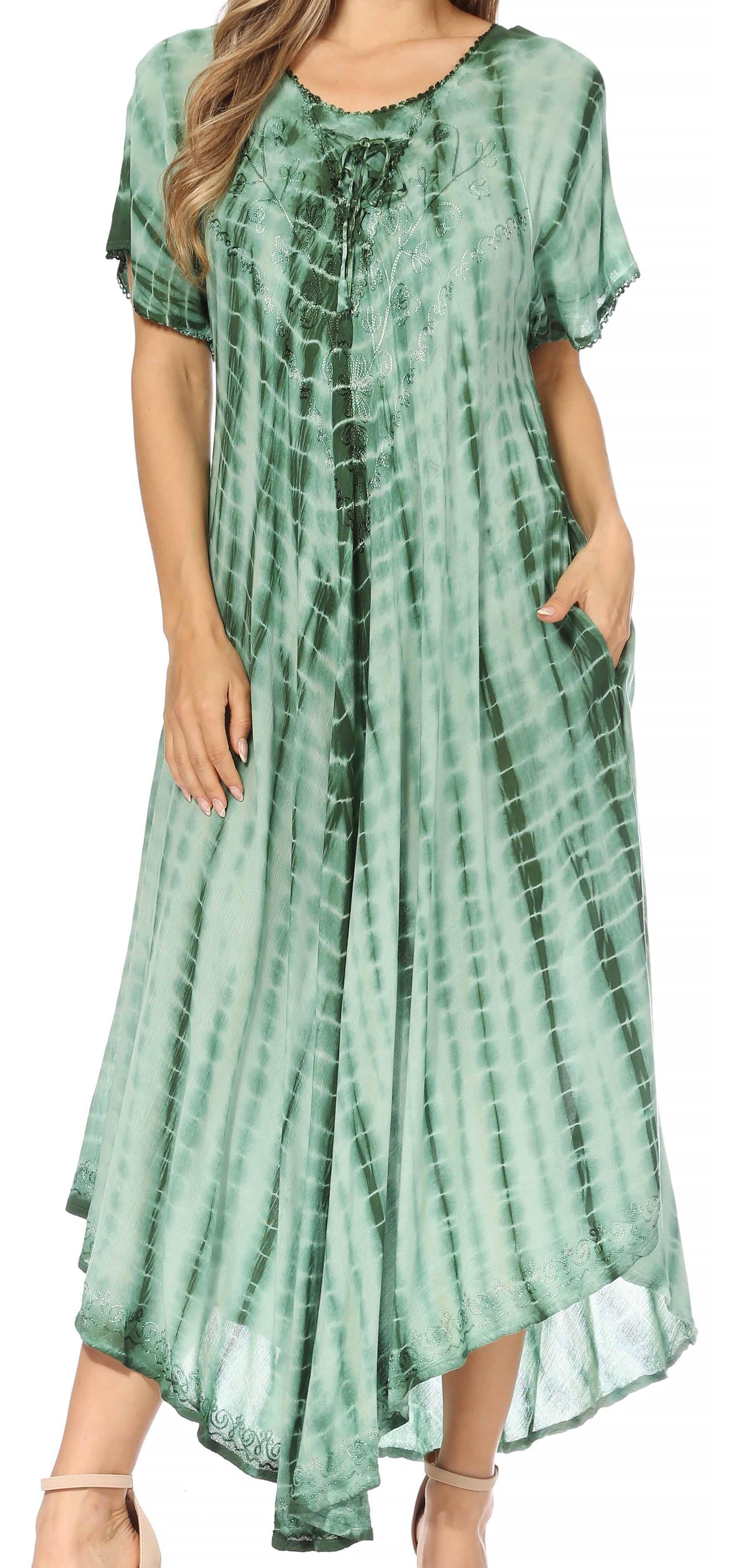 Green tie-dye dress worn by a model on a white background