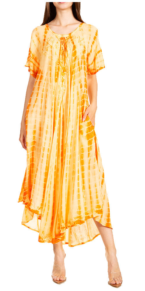 Woman wearing a yellow tie-dye dress on a white background