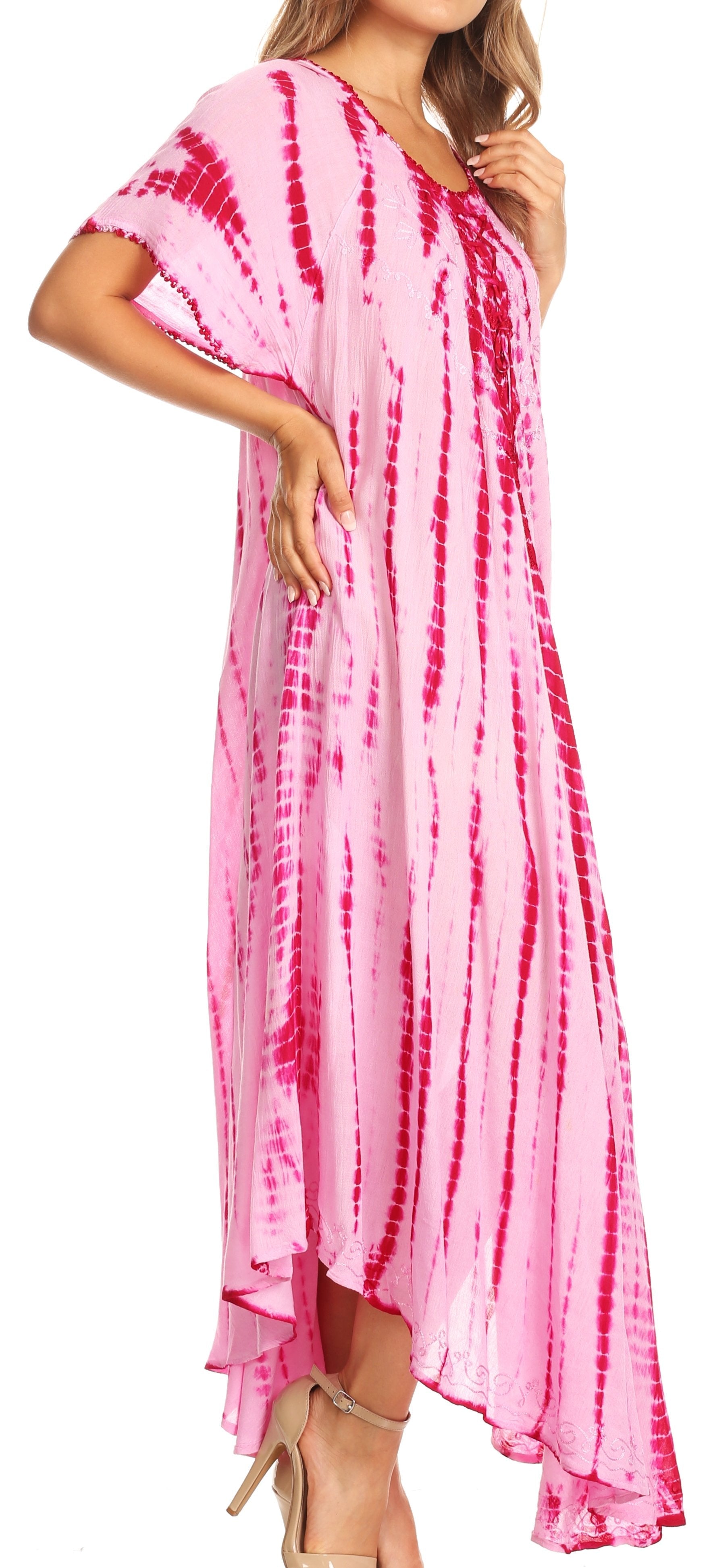 Pink tie-dye dress worn by a model on a white background