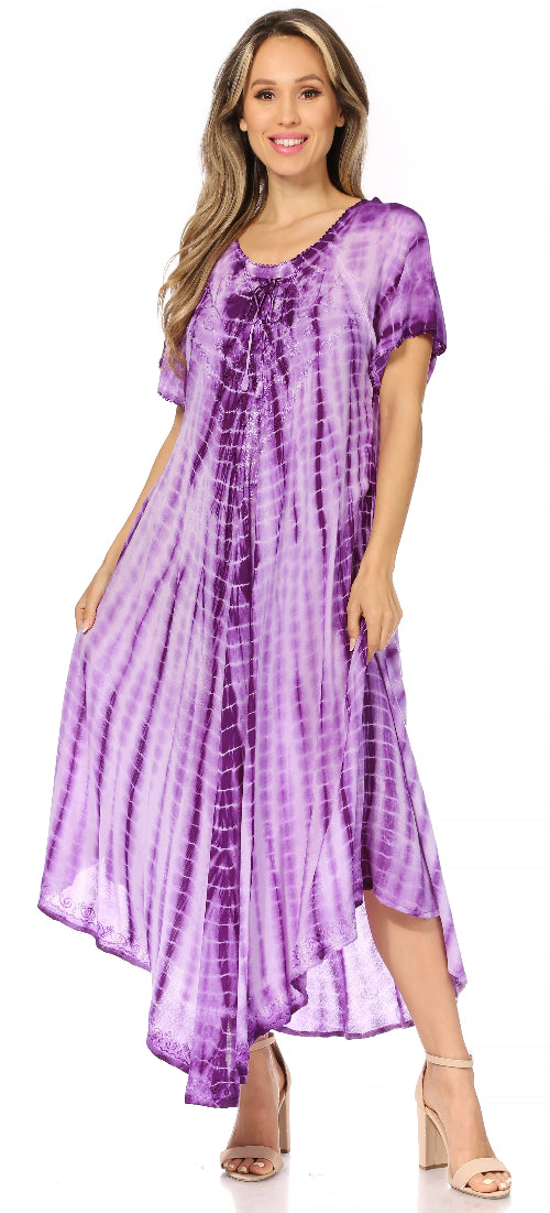 Woman wearing a purple tie-dye dress on a white background