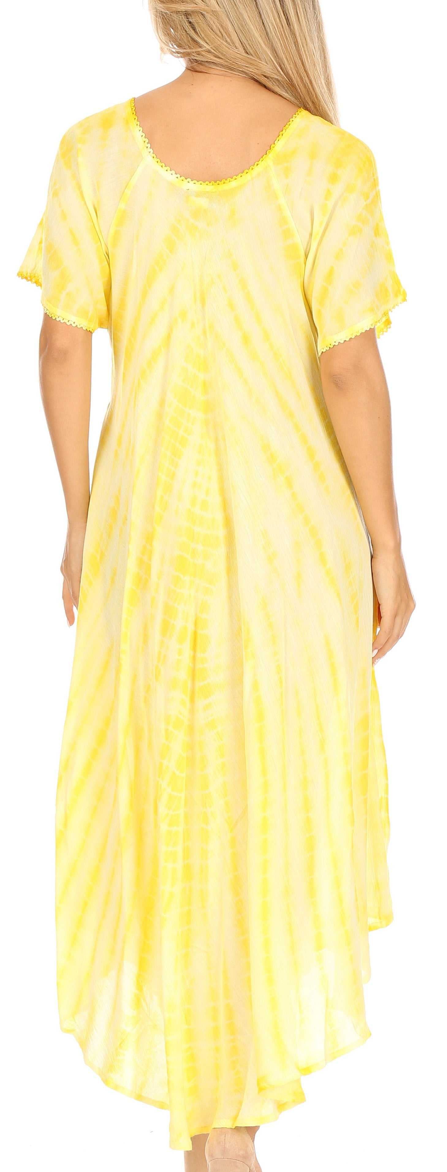 Yellow tie-dye dress worn by a person with a blurred background