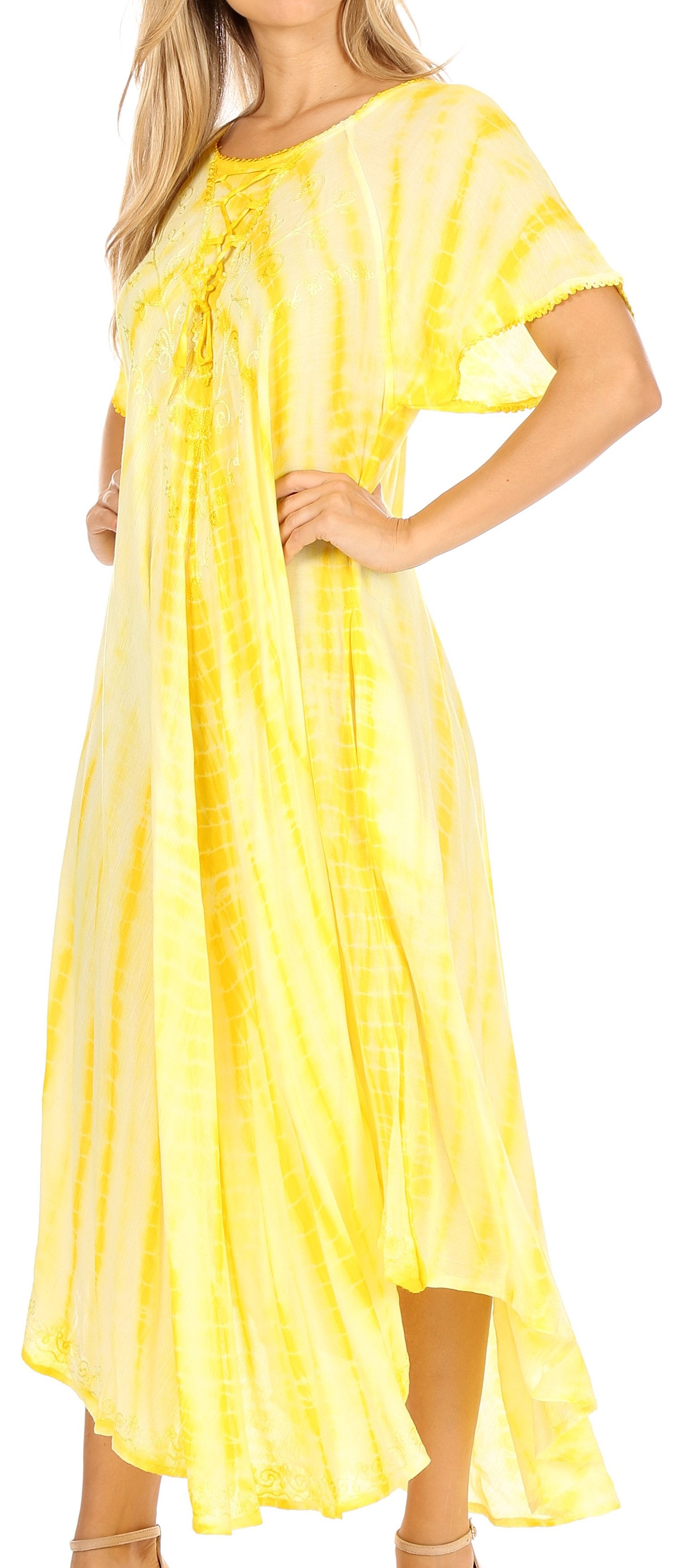 Woman wearing a yellow dress with a plain background