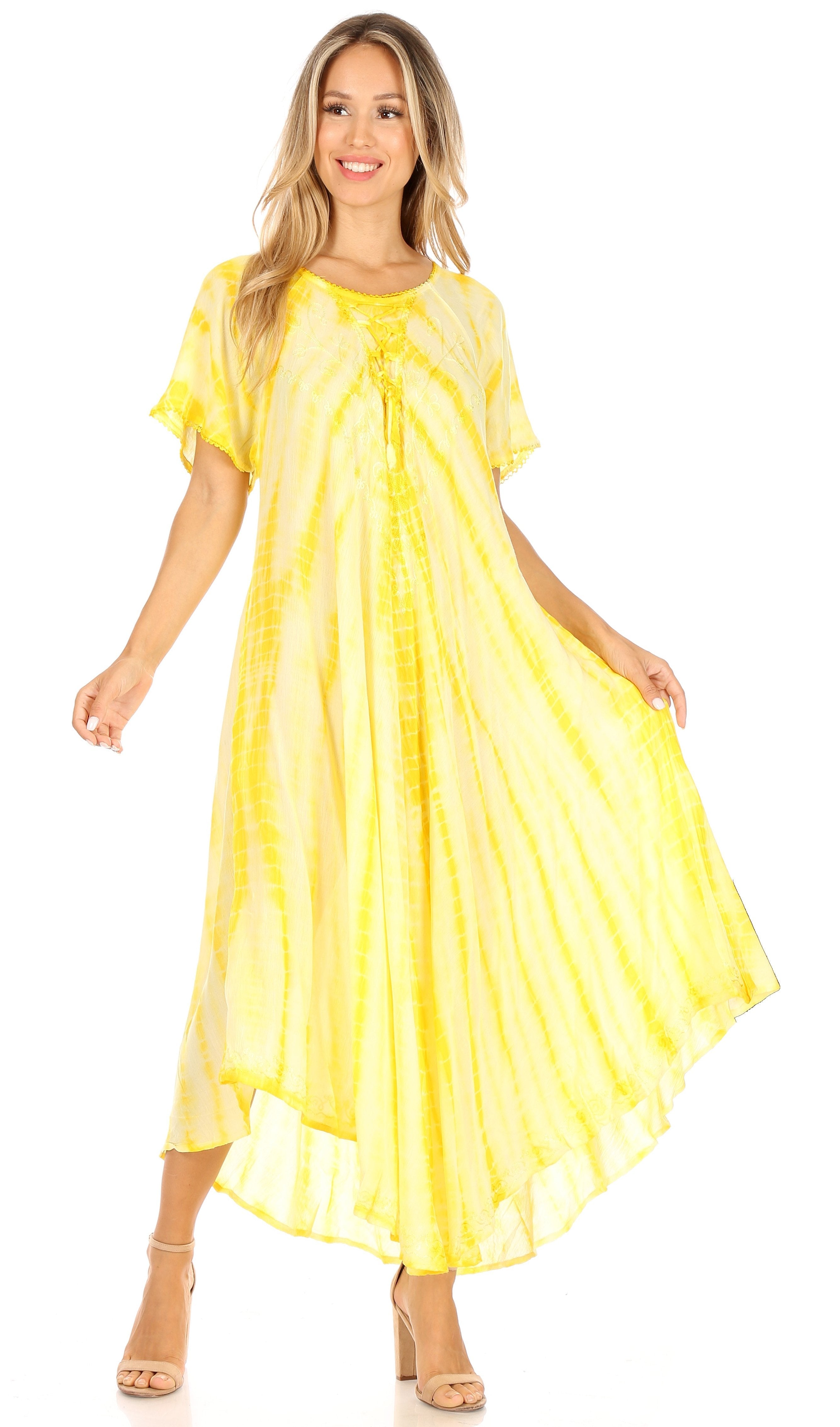 Woman wearing a yellow dress on a white background
