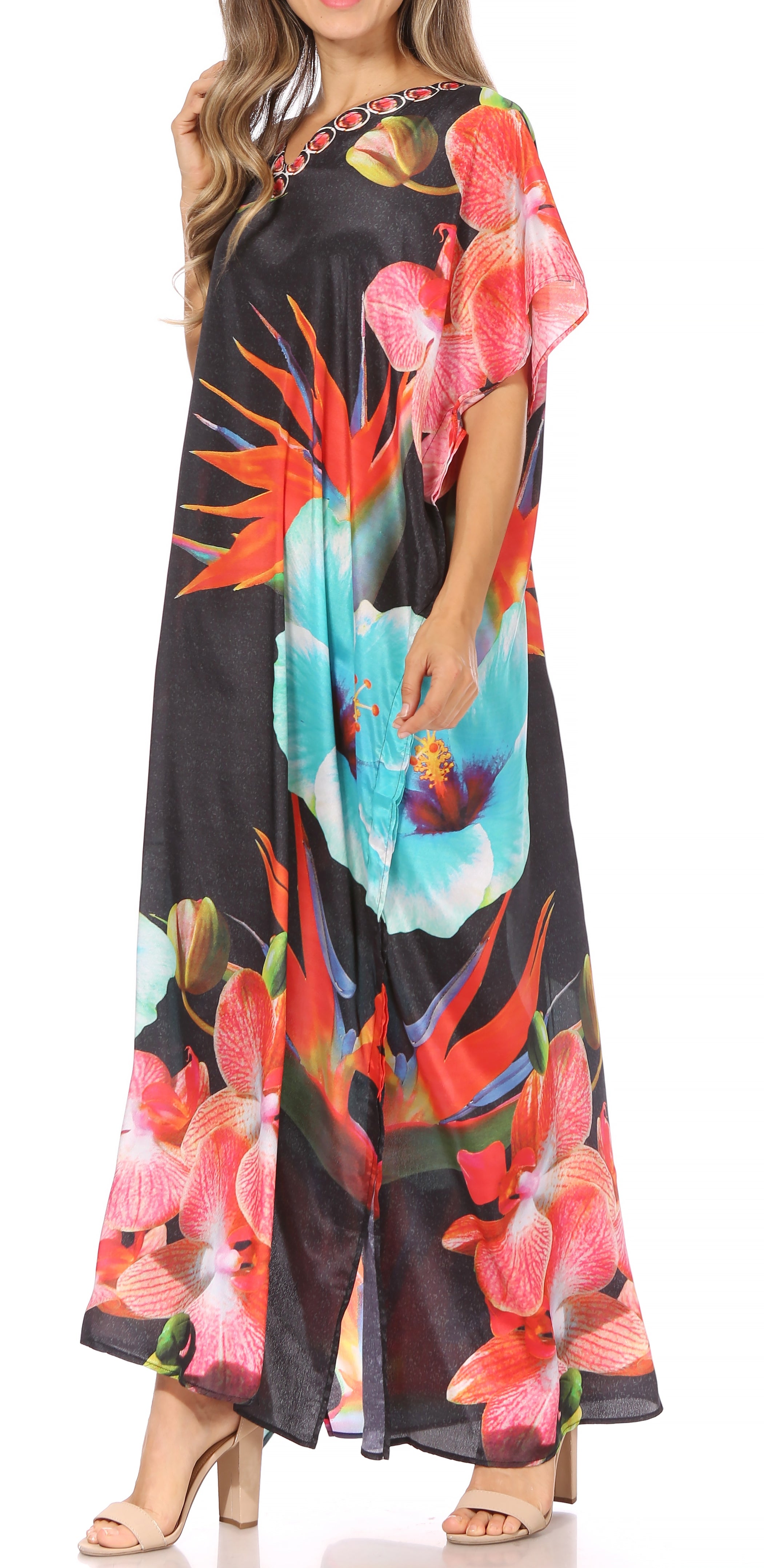 Woman wearing a colorful floral dress on a white background